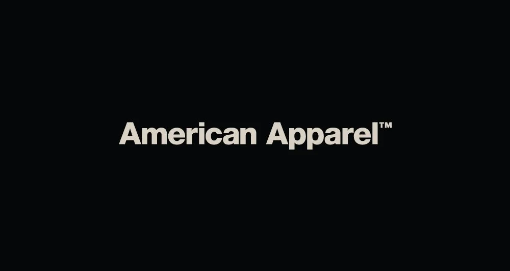 Black background with white text reading "American Apparel"