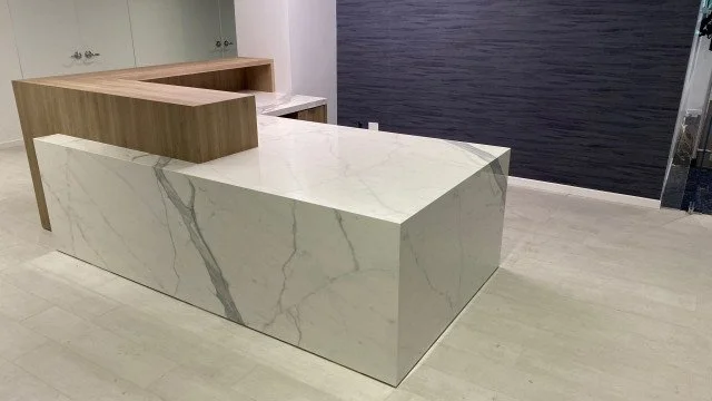 nyc-reception-desk-marble-works-design-team-inc-img~abd13b510f0a036f_4-5542-1-b2378e4.jpg