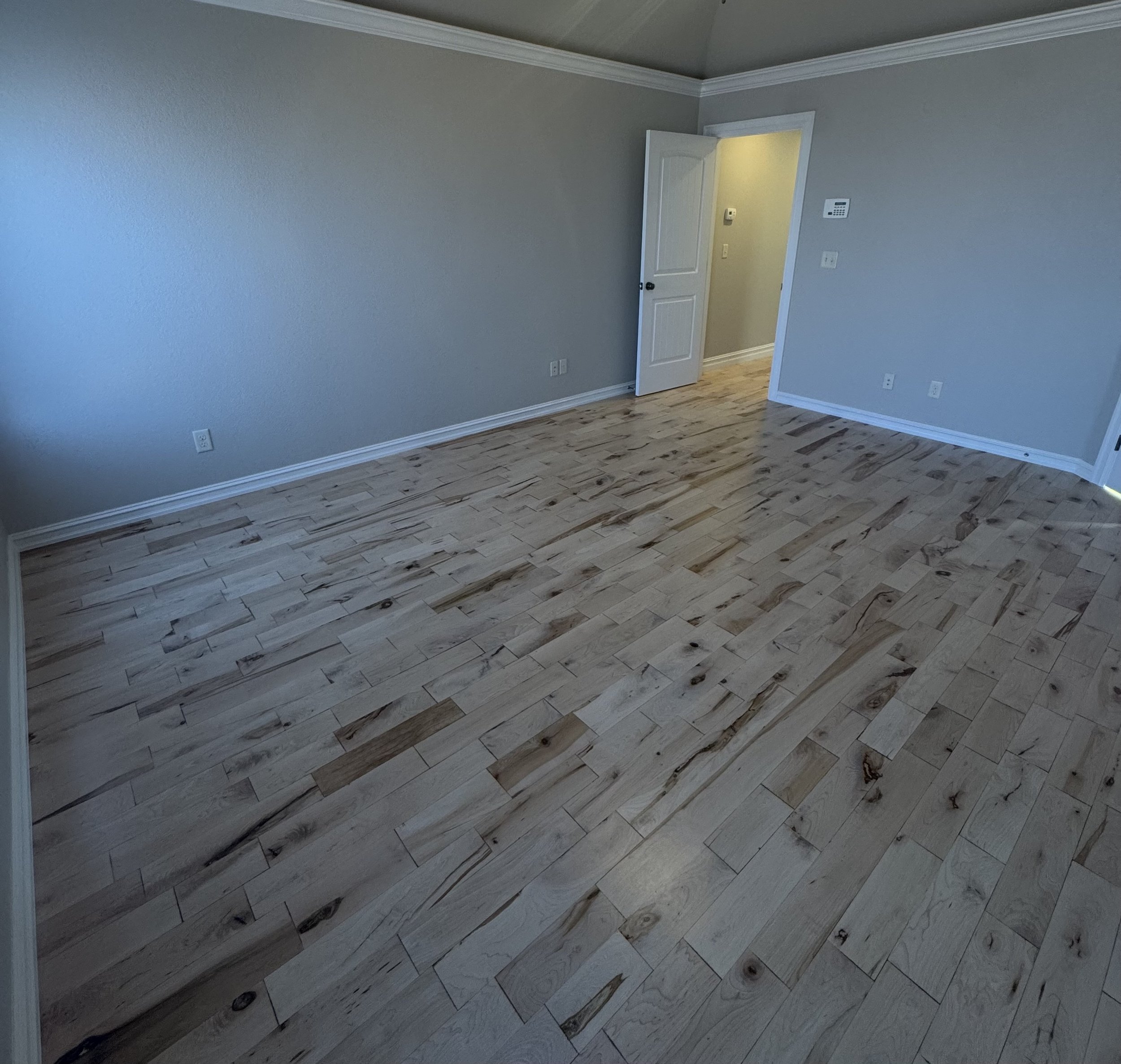 Re-coat of maple floor with water base finish.