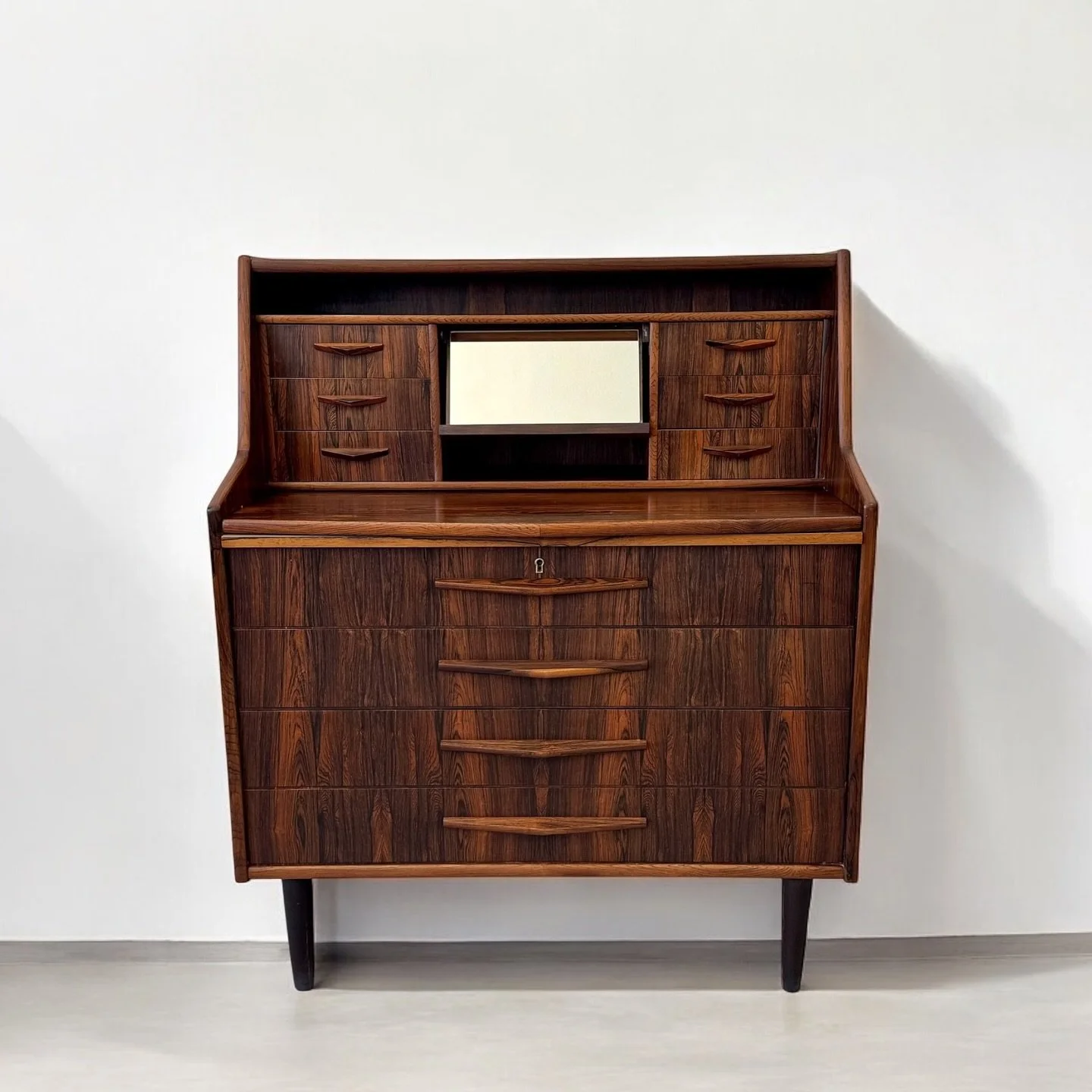 New in store: the most stunning Danish secretary in Brazilian Rosewood. 

Origin: Denmark circa late 1950s &mdash; designed by Erling Torvits for Heltborg M&oslash;bler.

Showcasing exquisite attention to detail, this lovely piece is crafted with stu