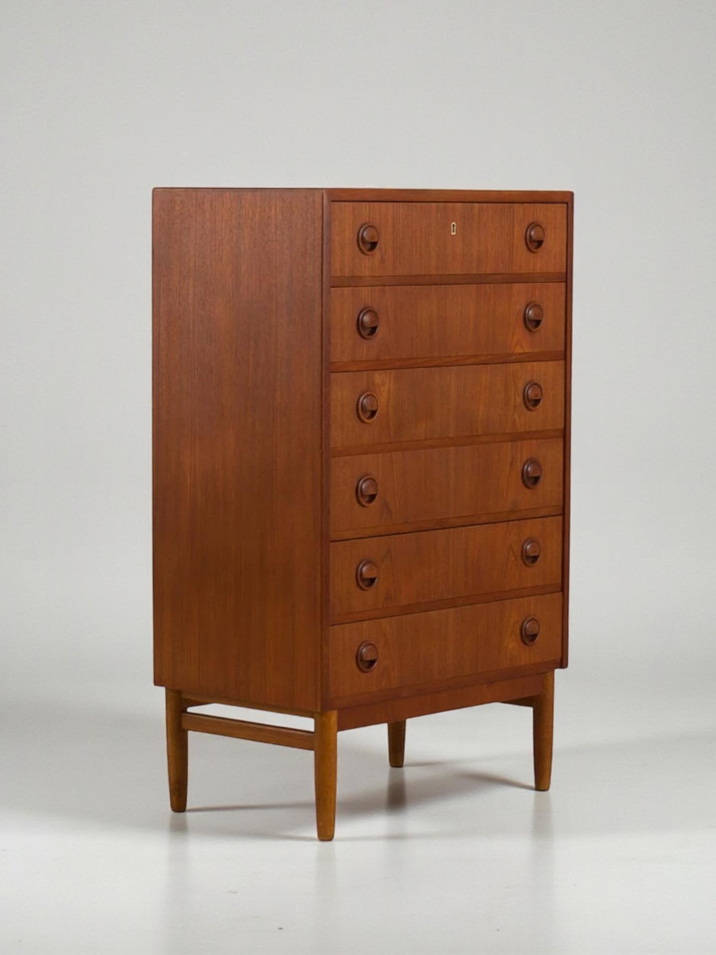 Just arrived from Denmark and now available on our website: A fantastic tallboy by the esteemed Kai Kristiansen. Featuring six drawers, sculpted eyelet handles and a classically sleek Scandinavian design, this chest is a bedroom staple. The carefully