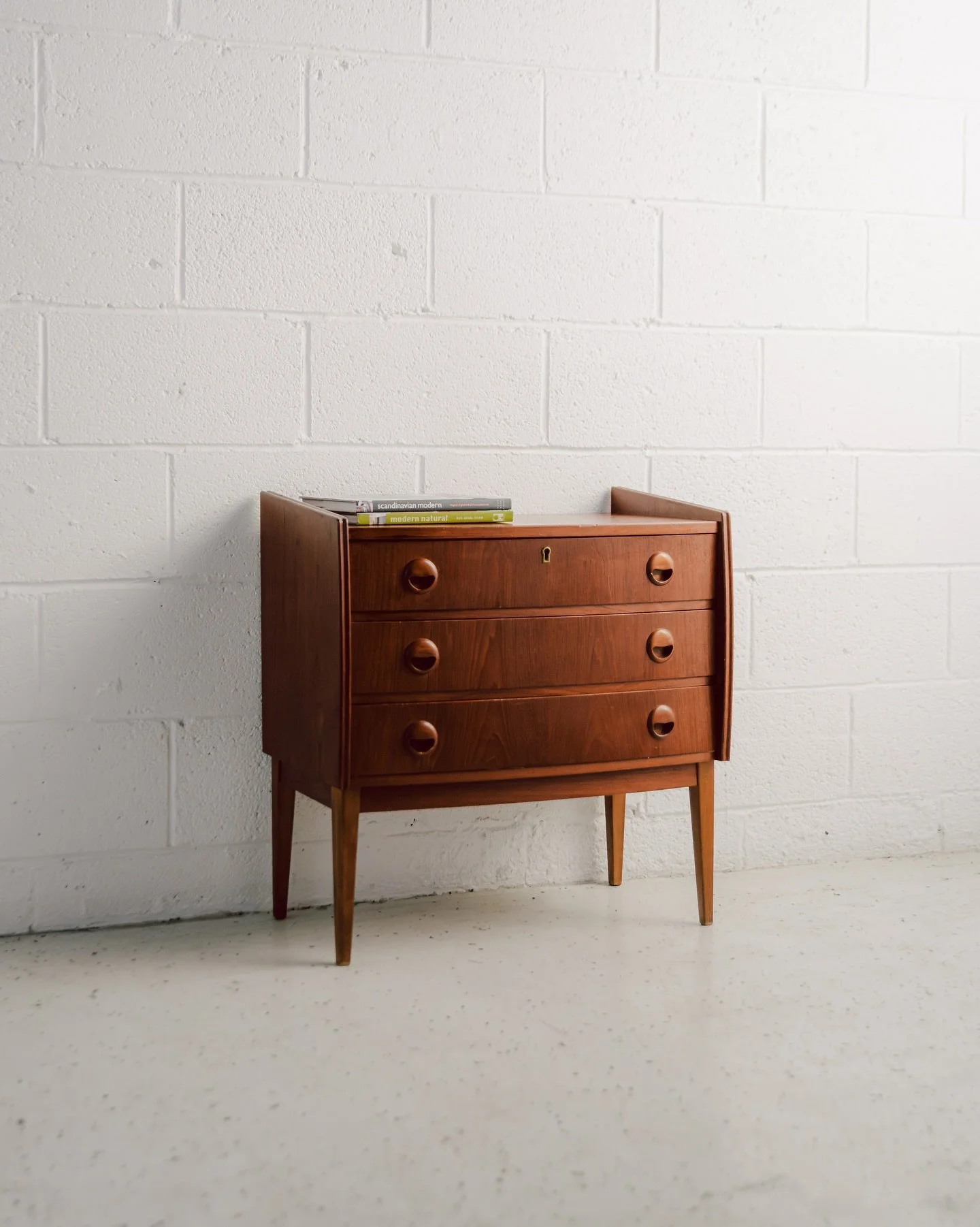 Fresh from Denmark, this super sweet chest of drawers attributed to Kai Kristiansen is now ready for some lucky person&rsquo;s home 🏡 

A lovely compact piece featuring three drawers with our favourite half-moon handles. A refined and functional exa