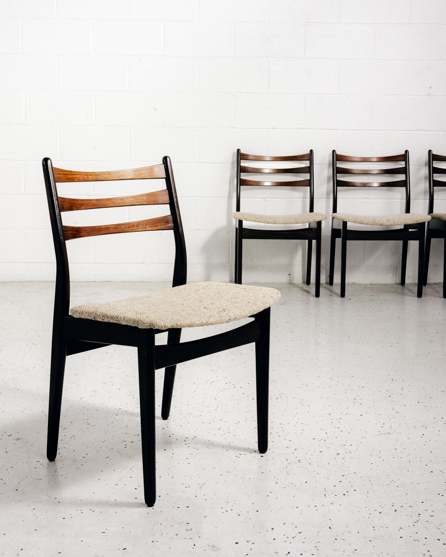 New in store: A drop dead GORGEOUS set of 6 Brazilian Rosewood Dining Chairs, with beautifully crafted ladder-backs. These currently feature their original upholstered seat-pads, which can be left as is, OR give them a makeover with new upholstery in