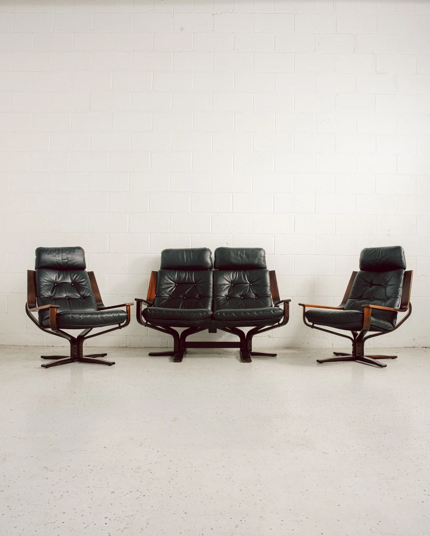 New in store: A super swanky three-piece Joe Rufenacht lounge suite in bentwood and black leather. 

This gorgeous suite, inspired by Norwegian design, features a 2-seater sofa and a pair of matching swivel armchairs. 

Stained bentwood frames and bl