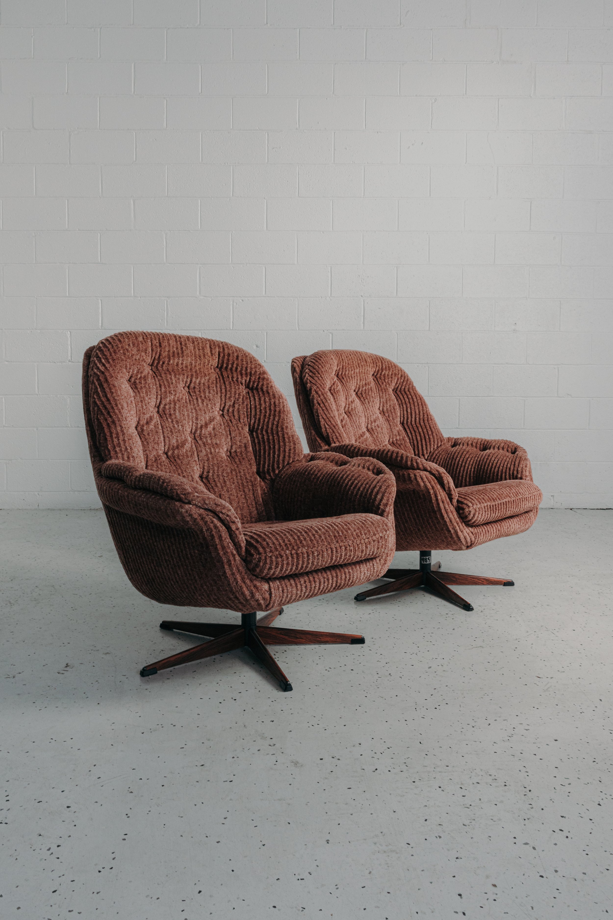Pair of H.W. Klein Swivel Chairs
