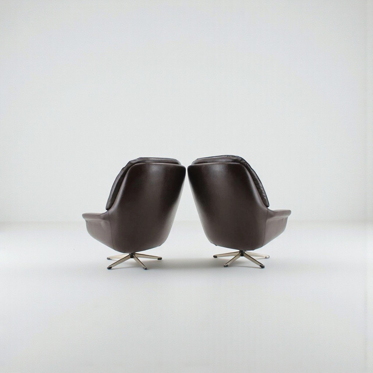 hw klein dark brown swivel chairs-Photoroom.jpg