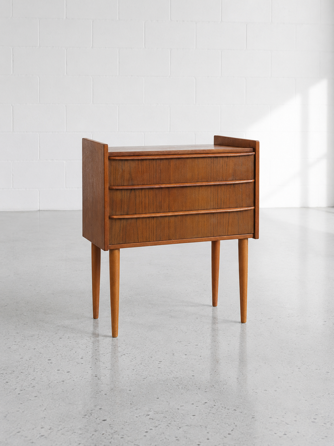 Danish bedside table in teak.png
