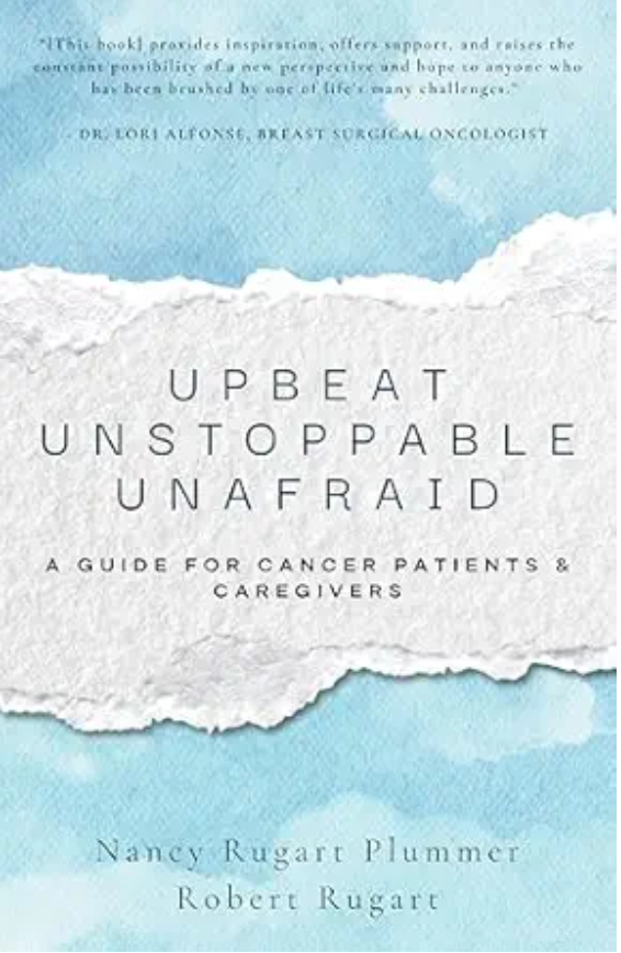 Book cover titled "Upbeat Unstoppable Unafraid: A Guide for Cancer Patients & Caregivers" by Nancy Rugart Plummer and Robert Rugart, with a background of blue sky and torn paper design.