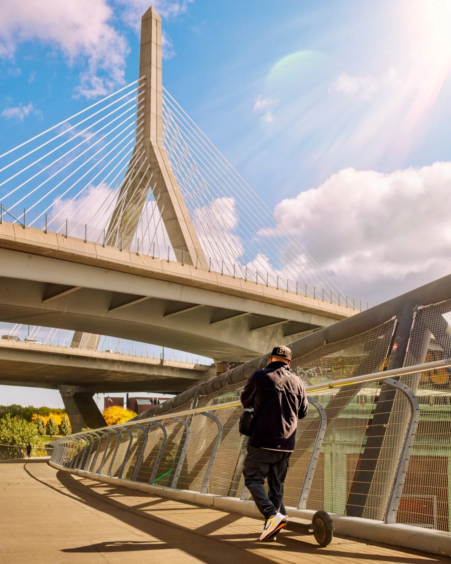 Bridges and sunlight,  Boston mornings hit different ☀️ ☁️ 
There&rsquo;s something about walking beneath the Zakim Bridge when the city feels quiet, the light hits just right, and fall colors still linger along the edge of the Charles. These moments