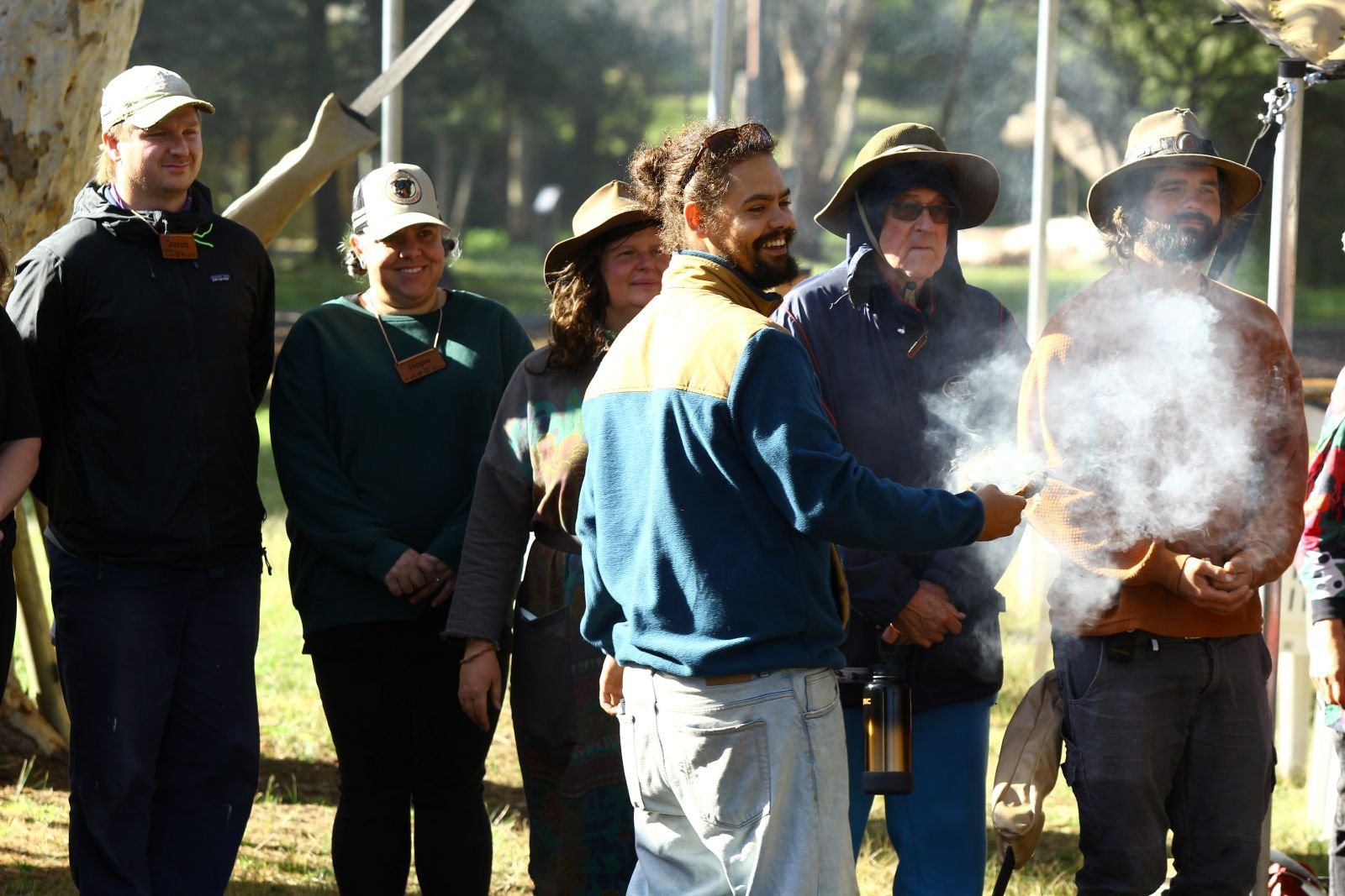 An indigenous man during a smoking ceremony held as part of a Welcome to Country.