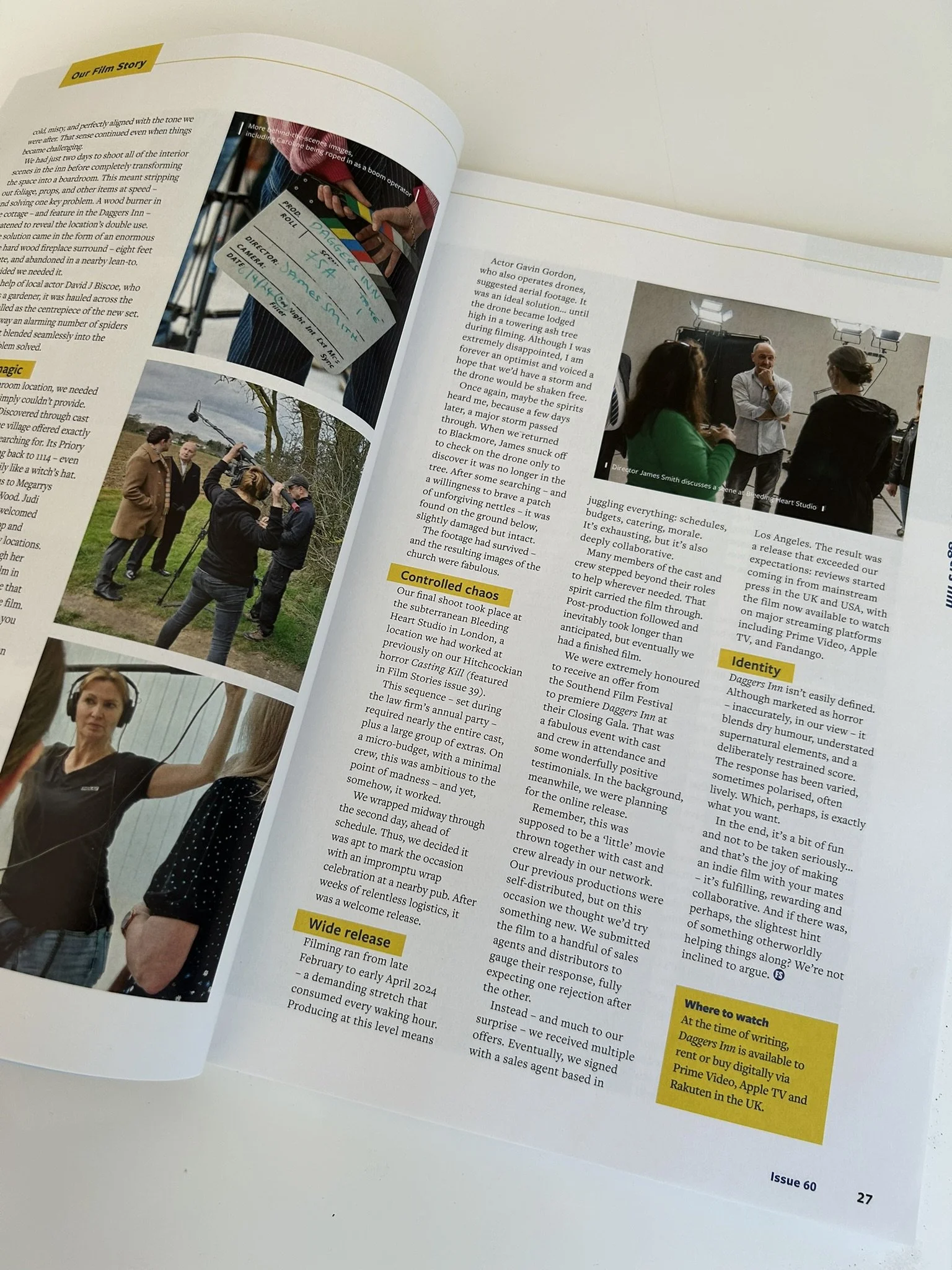 Open magazine showing images and text, including a photo of a film crew setting up outdoors, a clapperboard, and a scene of people in a studio with lighting equipment. Photos by Catherine Stratford.