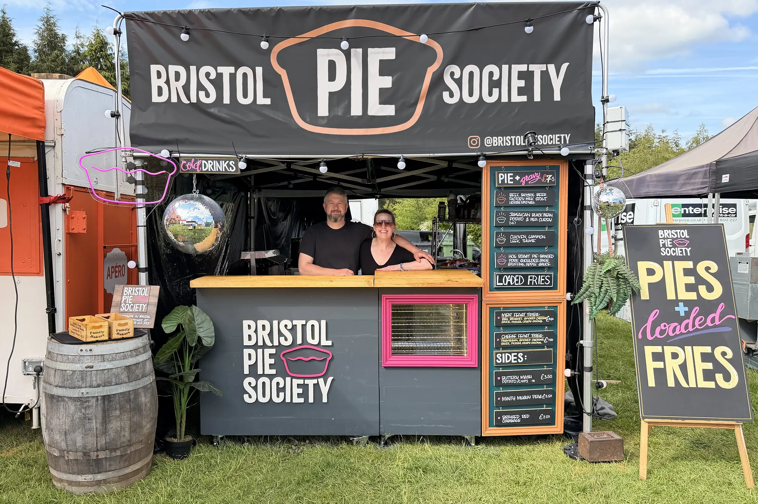 Bristol Pie Society market and event stall showcasing their menu of artisanal pies, loaded fries and sides at a festival.
