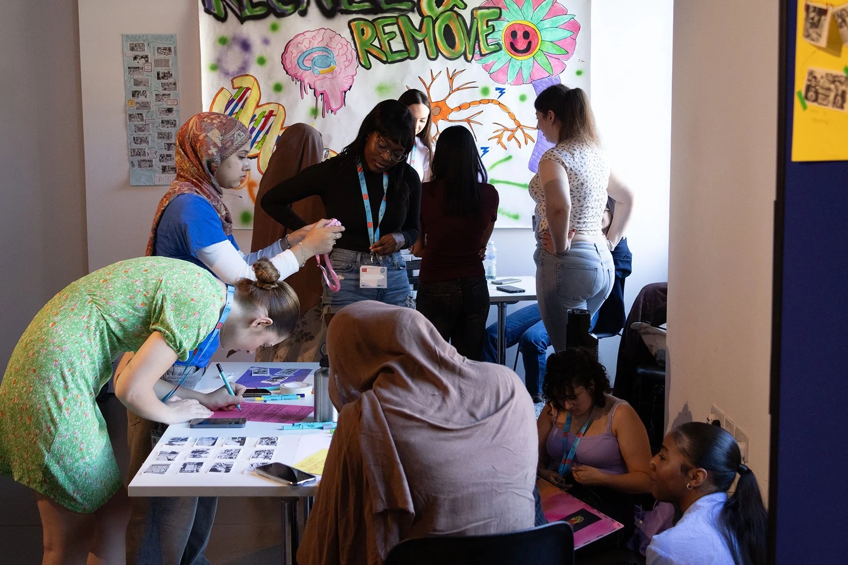 DNA participants prepare their final projects together.