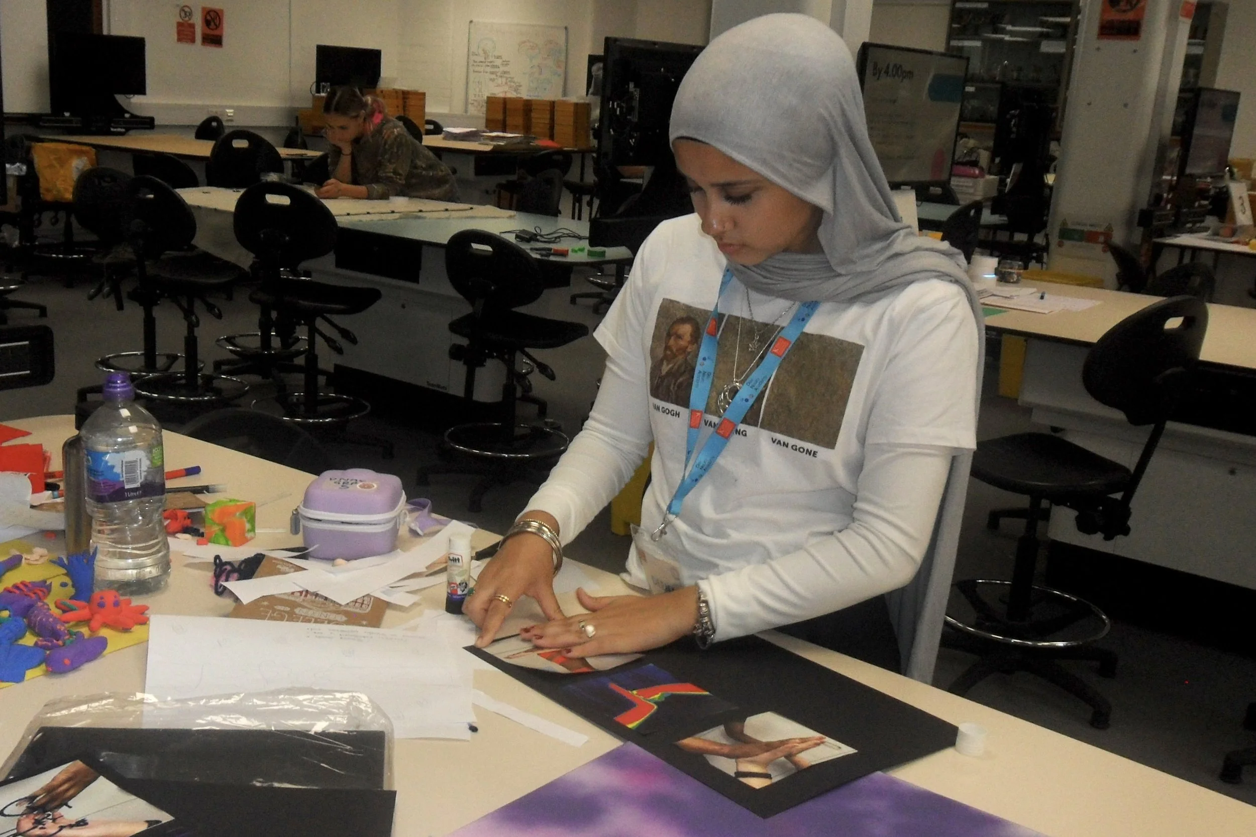 A DNA participant works on their project.