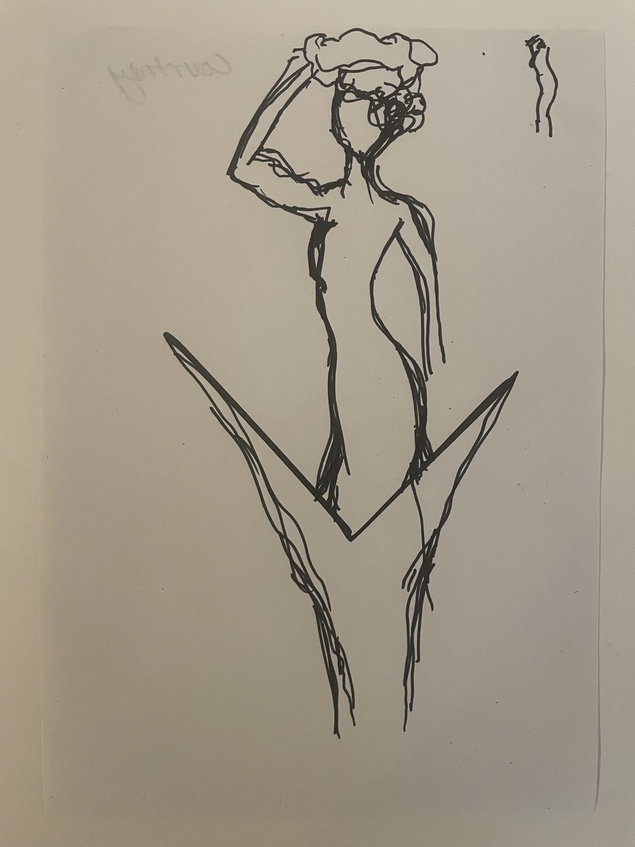 A figure of a woman emerging out of a leaf.