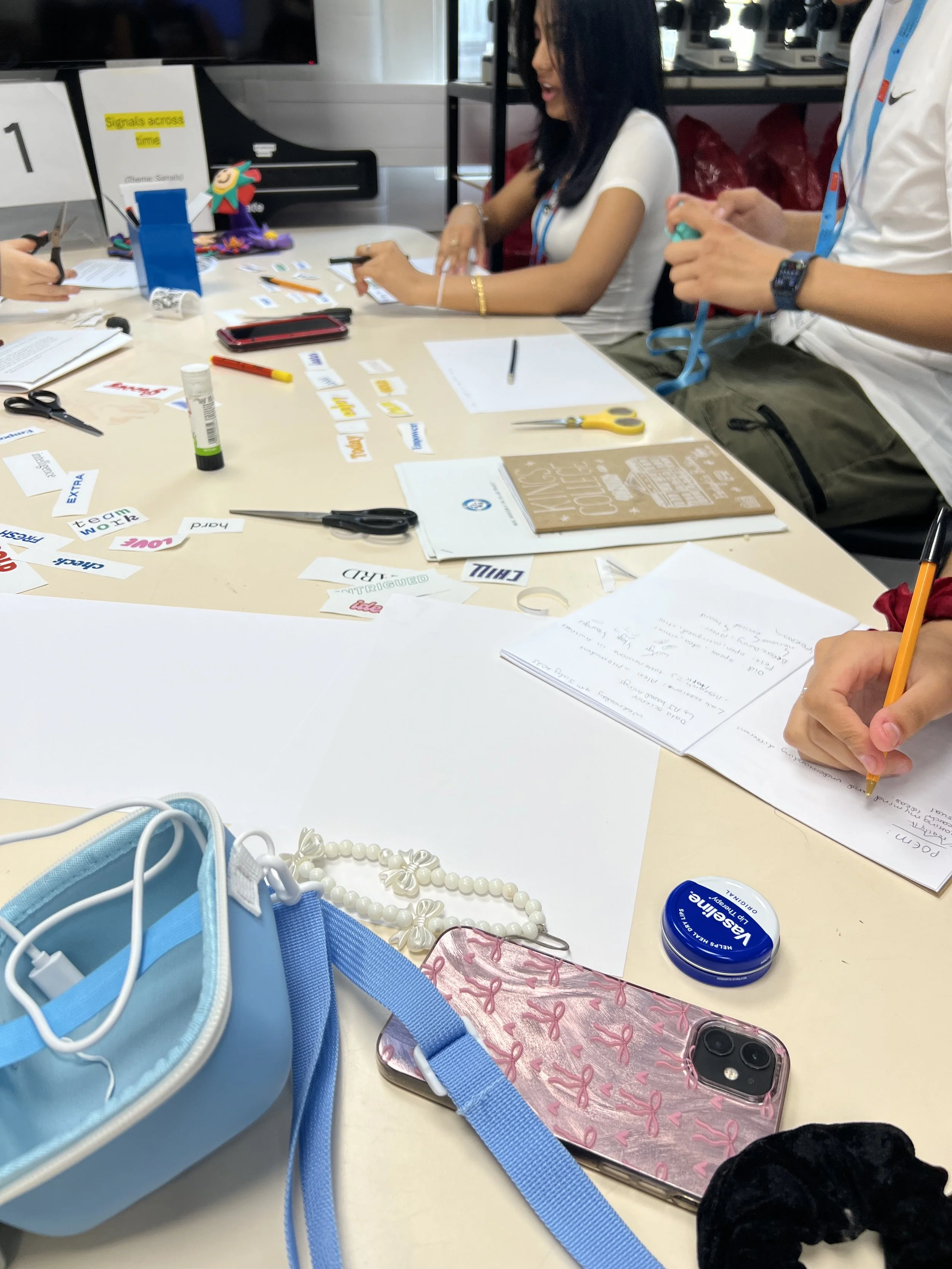 DNA participants write found poetry.