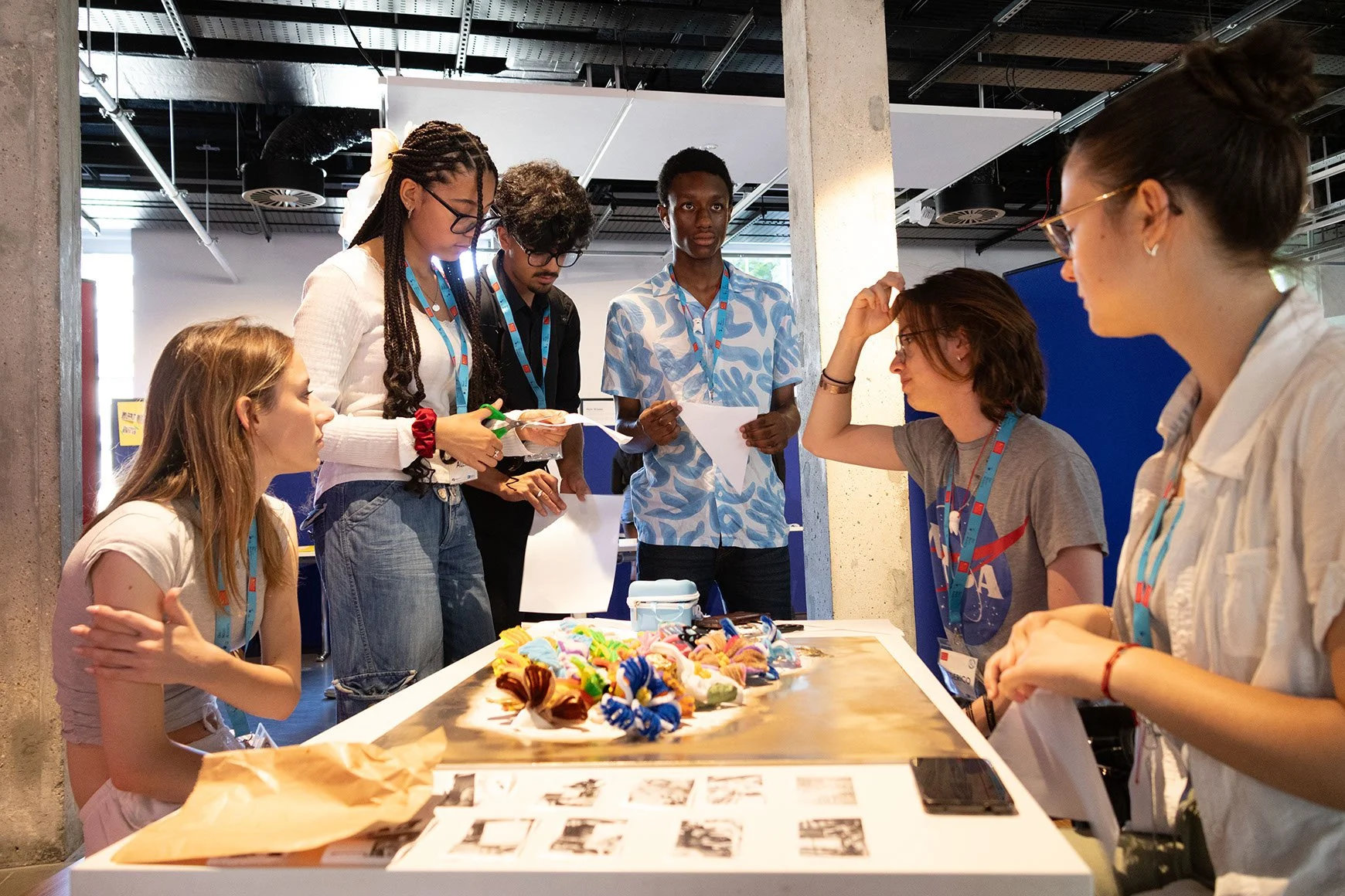A group of DNA participants add finishing touches to their project.