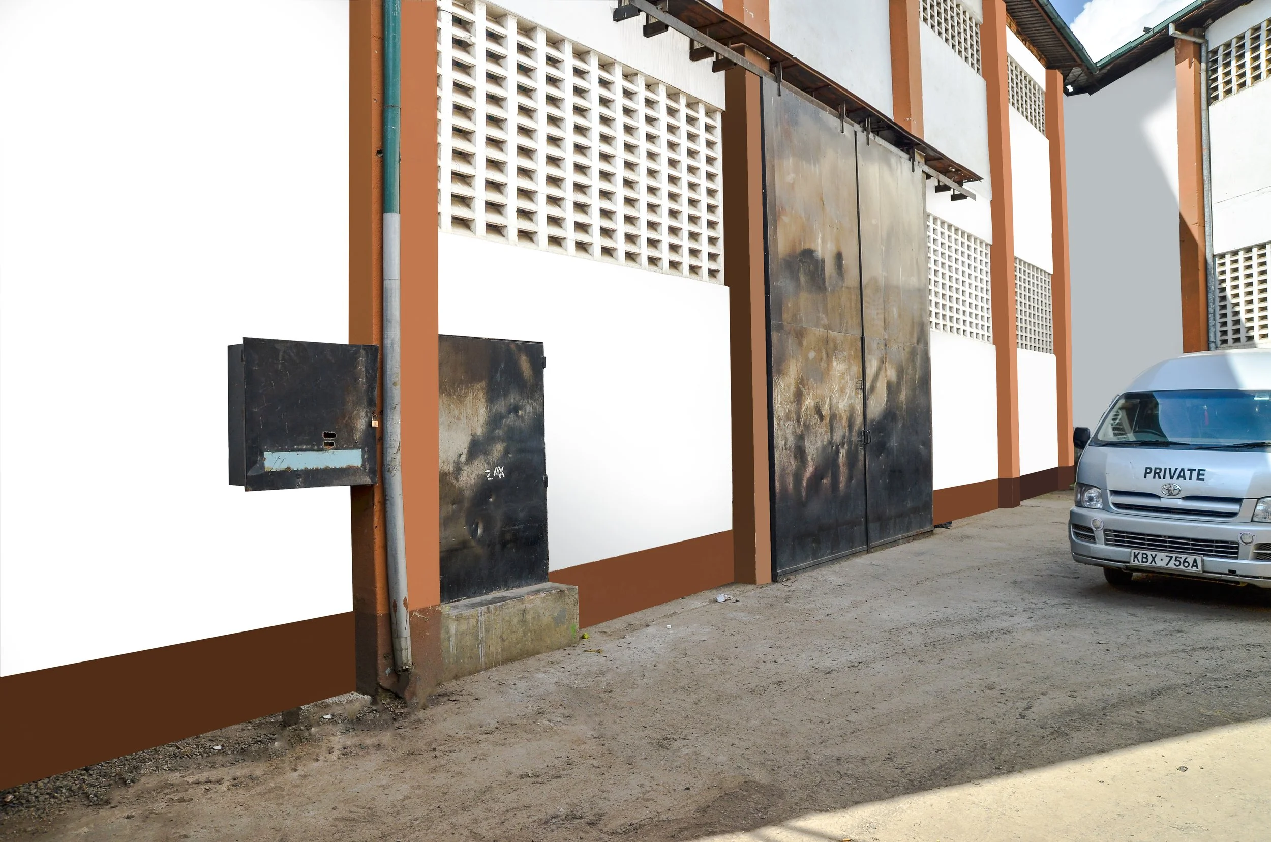 A partly digital rendering of a building wall with metal gate and box, brown wall borders, and a parked white van labeled 'PRIVATE' on a dirt ground.