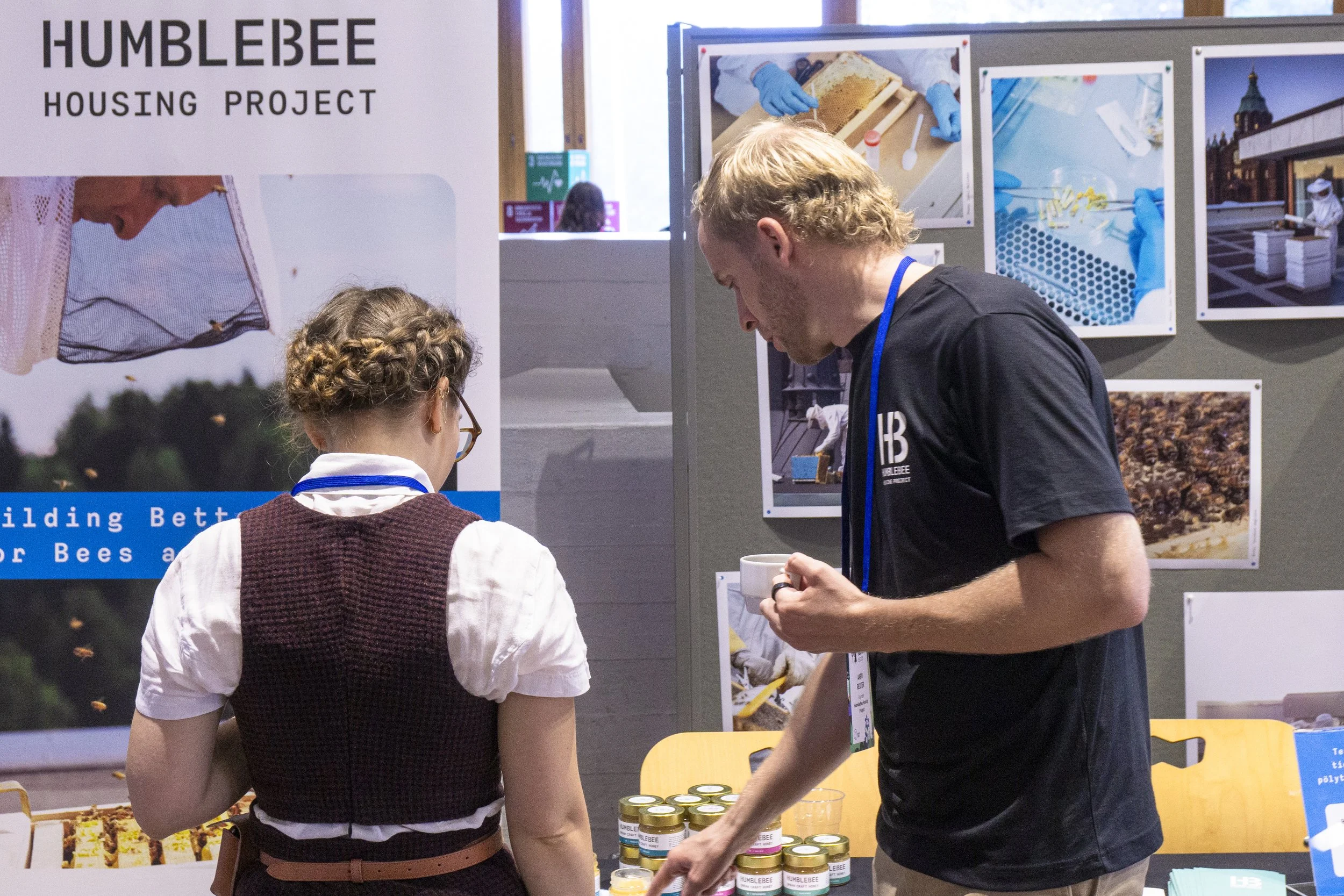 HumbleBee experts presenting urban beekeeping solutions and local honey at a sustainability event