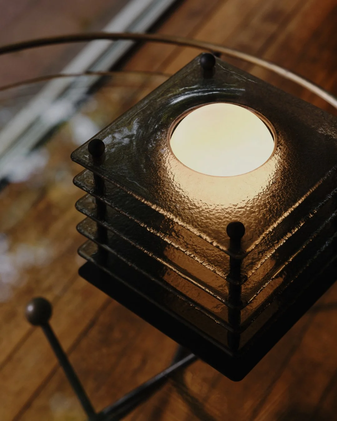 Light, when shaped with intent, becomes presence.⁠
⁠
The Ortus Table Light anchors its surroundings. Its smoked glass softens the edges of the space around it, and its opal core draws the eye inwards.⁠
⁠
Modernist in influence, timeless in feel, it o