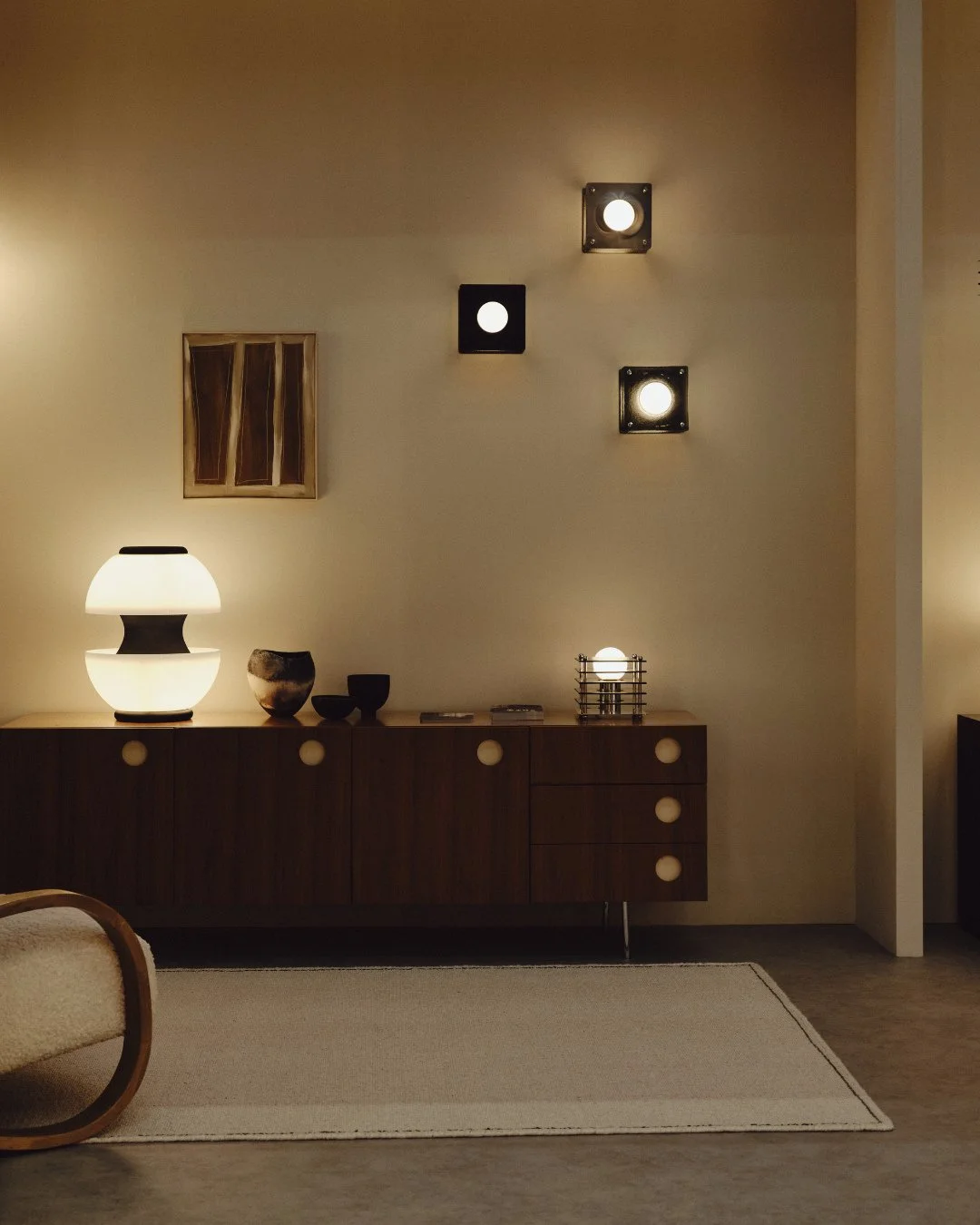 In a considered interior, lighting becomes part of the architecture.⁠
⁠
Forms anchor the room, casting soft halos and long shadows that bring warmth and depth to the surrounding space. The glow gathers gently across surfaces, allowing atmosphere to u