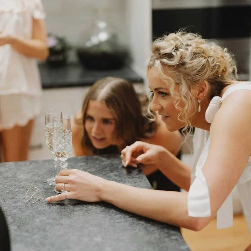 just checking out the levels. a very important part of the job 🤍

photo captured by the amazing @thomstewart 
hair @meganmatijasevichair 
makeup @amycapedamakeup 

#livinmoments #canberracontent #canberraweddings #canberraweddingcontent #nswweddings