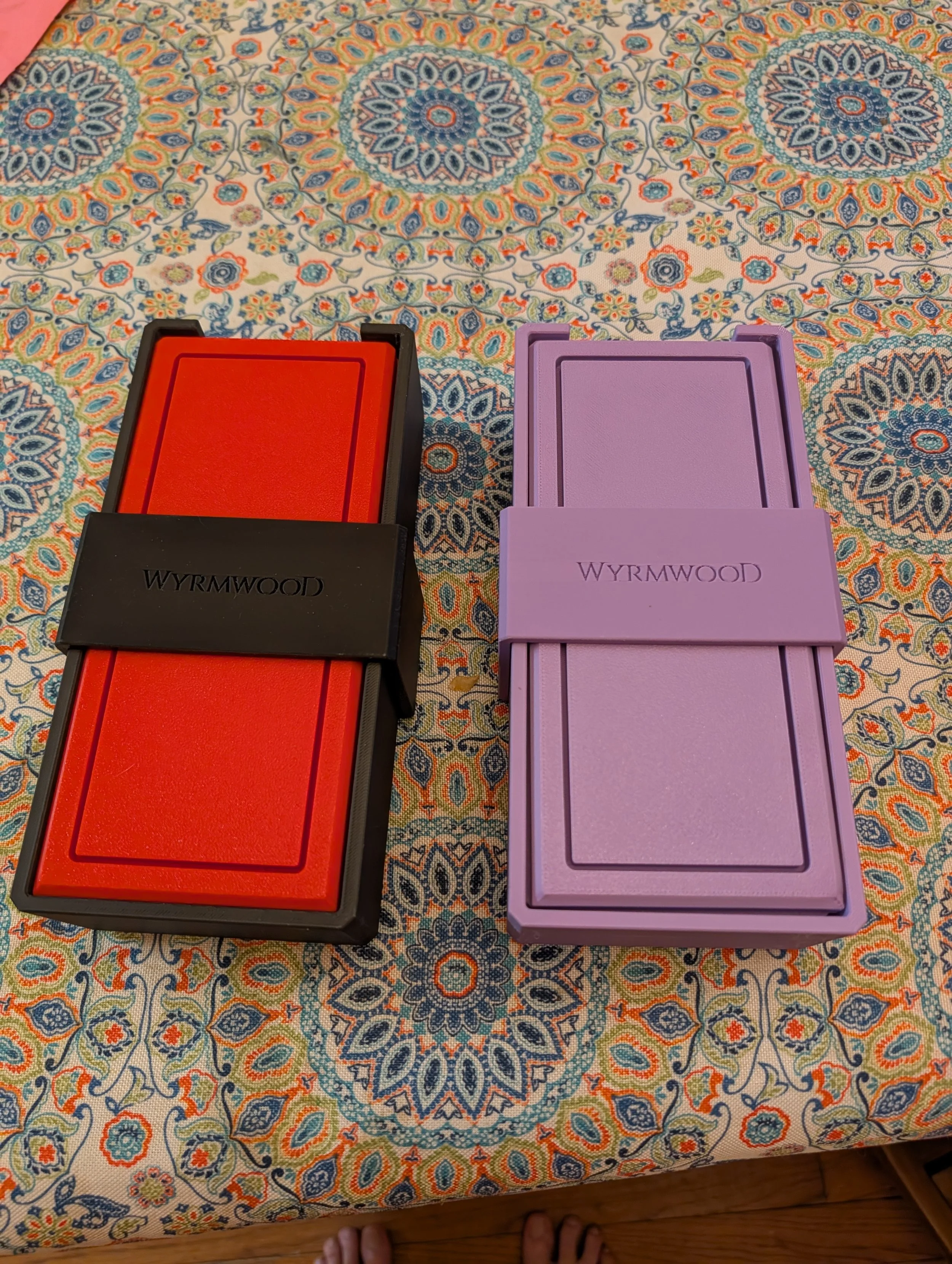 A Purple and Black Dice Tower and Tray. Licensed printer and seller of the Wyrmwood Magnetic Dice Tower system. They collapse down into a box that's much easier to carry