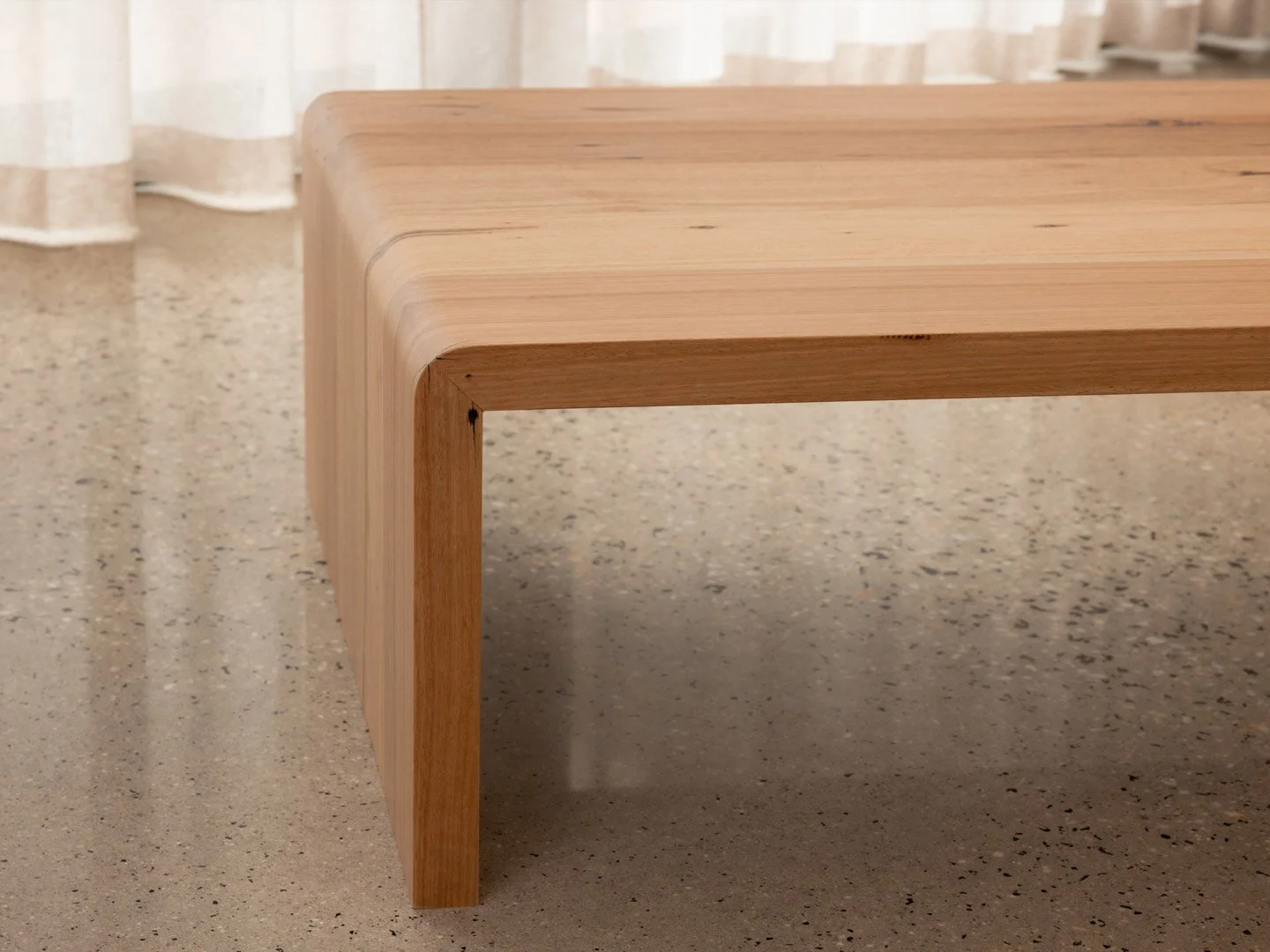 australian-reclaimed-wood-arc-coffee-table-angle-03.jpg