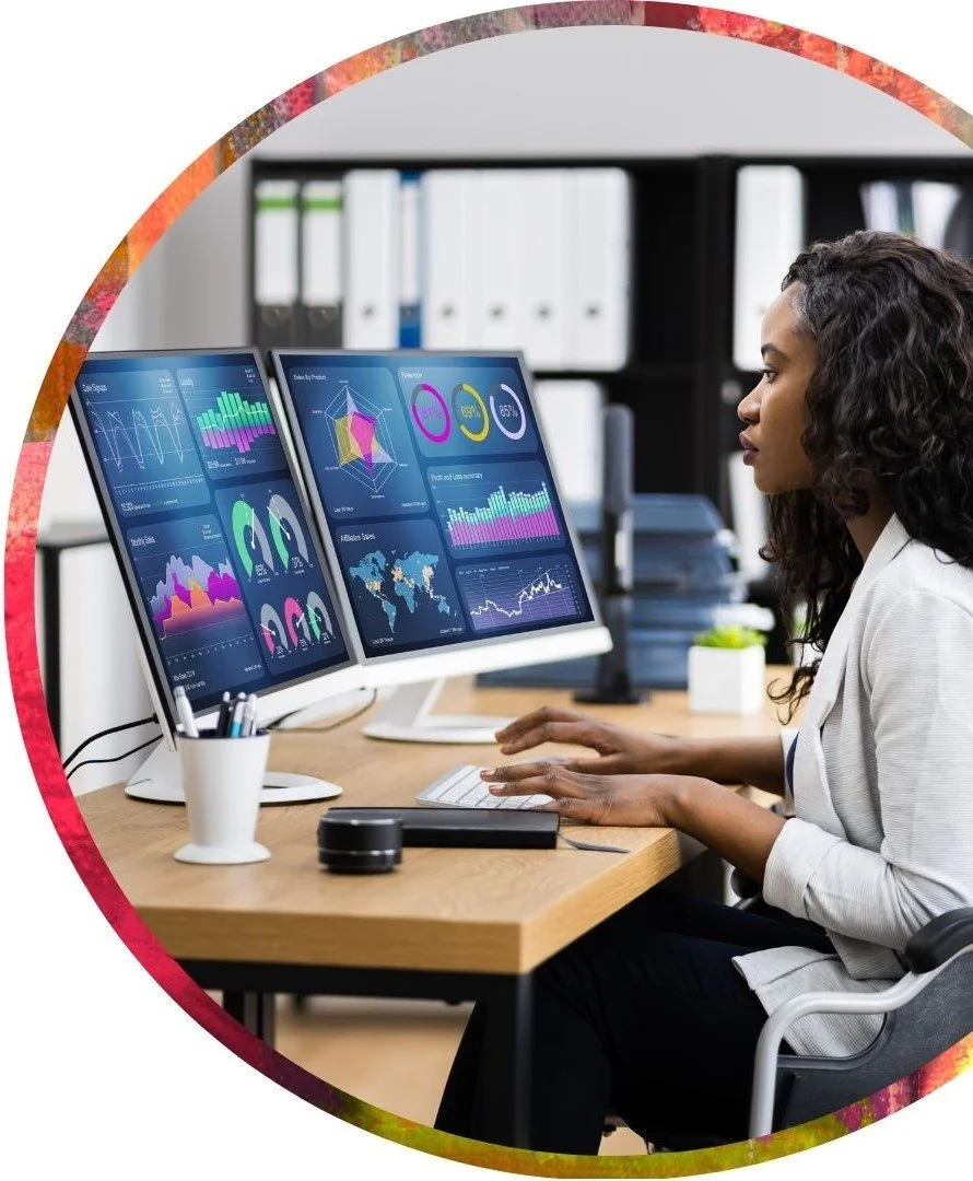 Junior data analyst working at computer