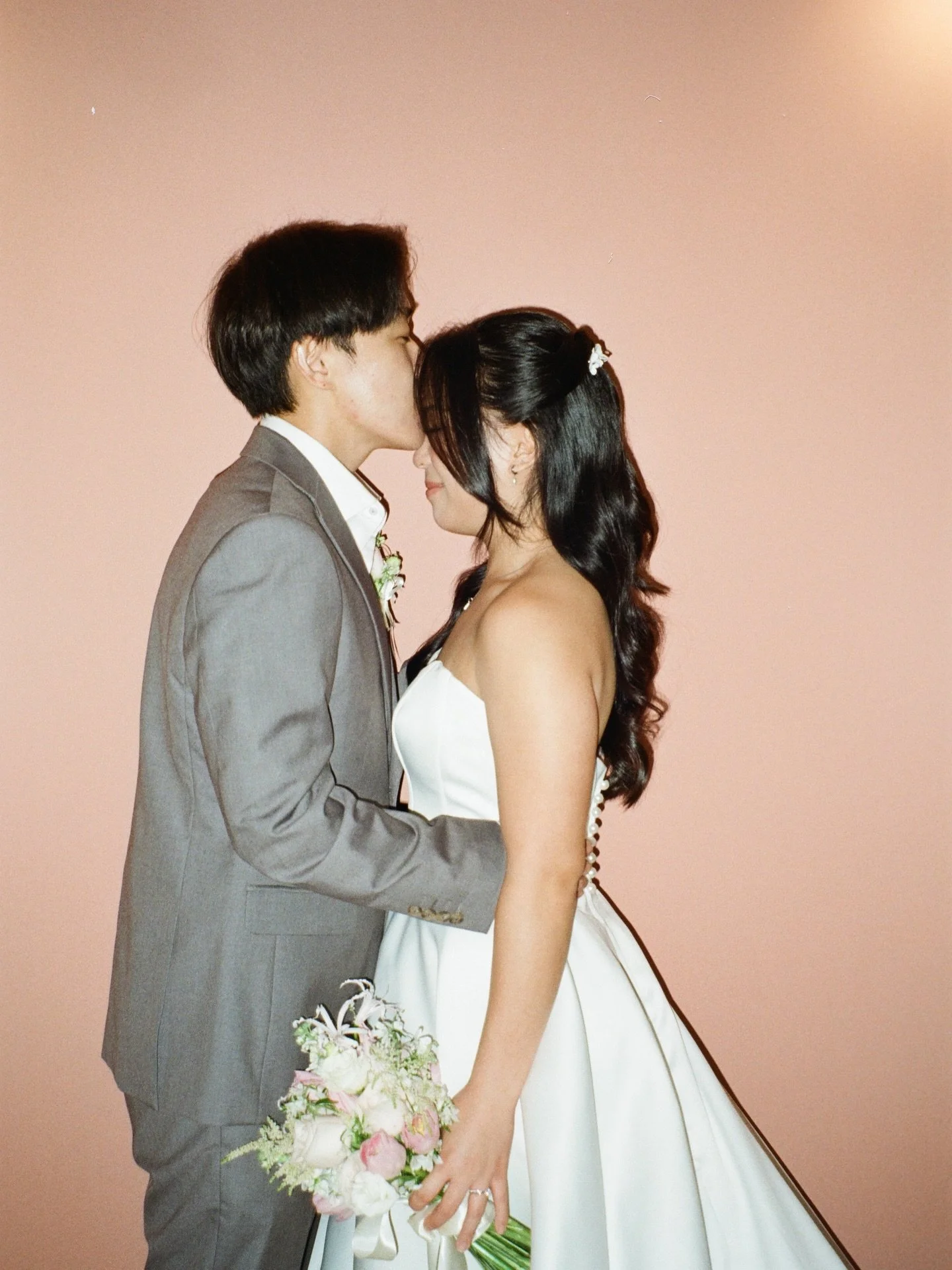 S &amp; K 

Shot via 35mm film camera 🤍 

Gown &amp; suit @glistencouture_sg 
HMUA @karynmakeupco 
Styling florist @edensground 
Space @ntualumniclub 
Couple @scott.tayyy @lokekaixuen

Films develop by @handsonfilm