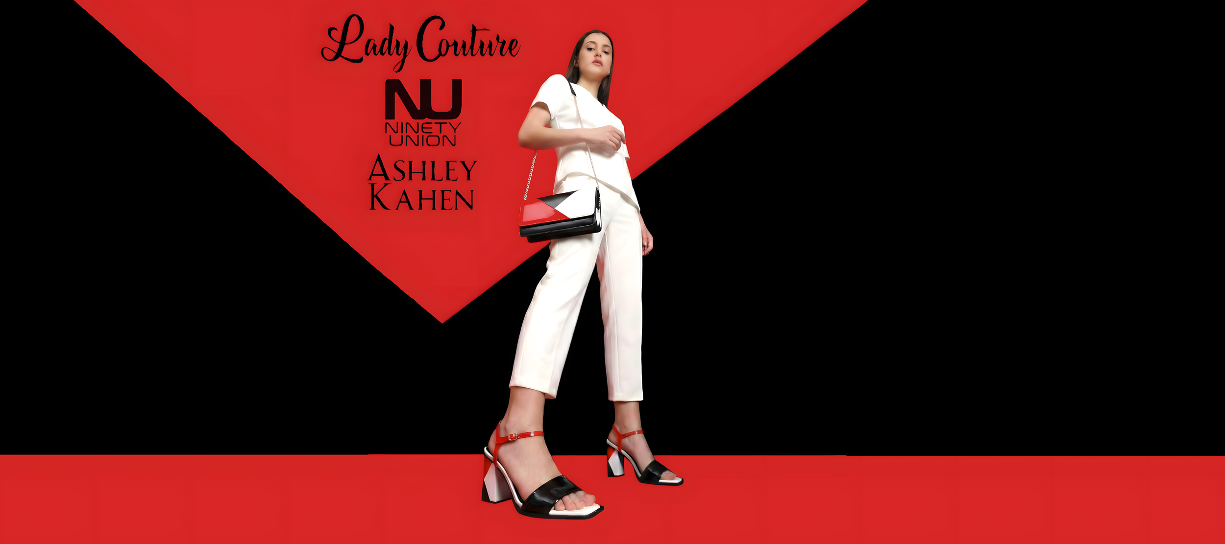 A fashion model wearing white pants and top, with black and red high heel shoes, holding a black and red handbag, standing against a background with black and red geometric shapes and black text that reads 'Lady Couture', 'NU Ninety Union', and 'Ashley Kahn'.