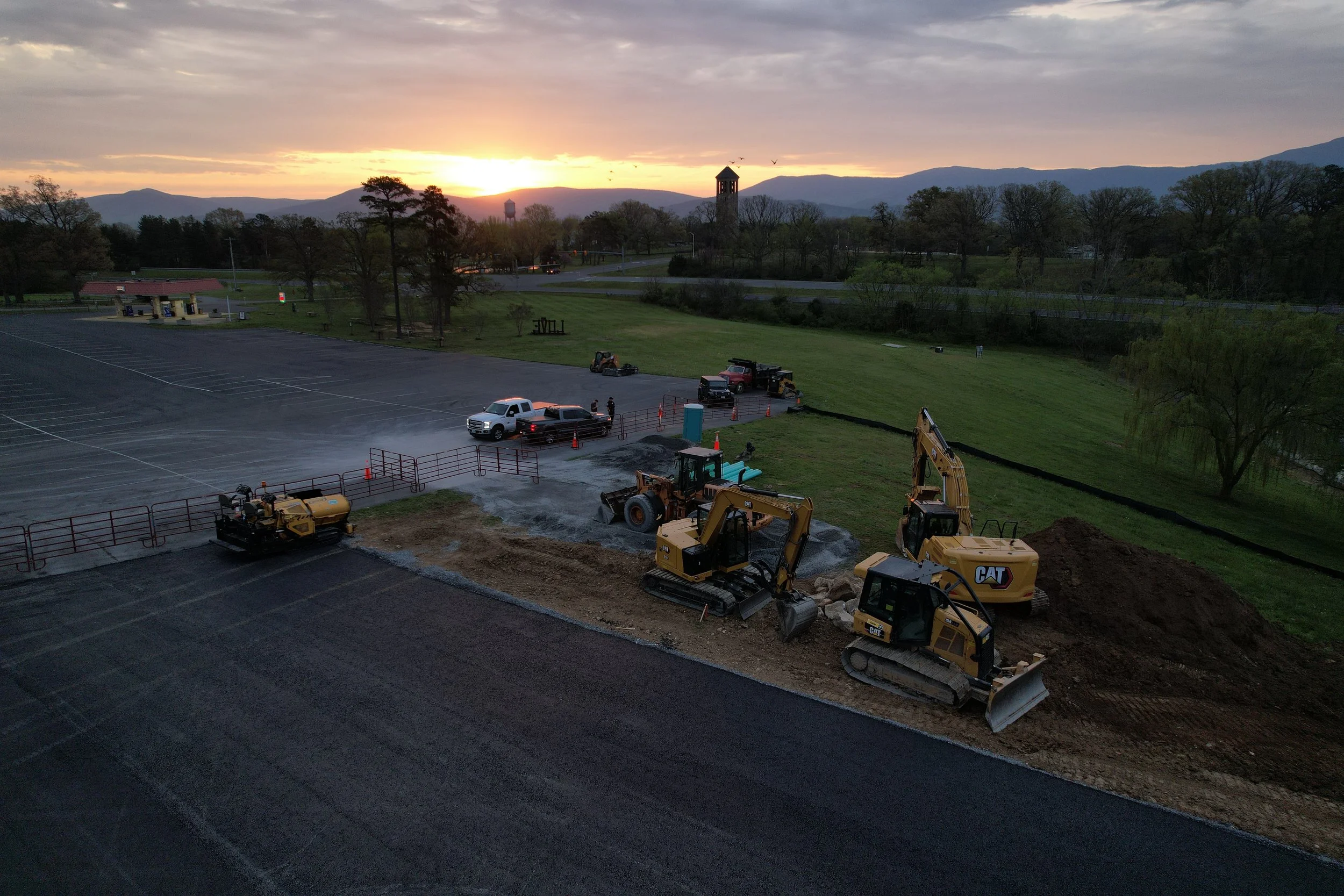 Oranssi technician working on a roof project