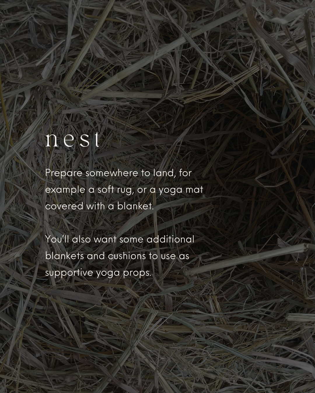 Close-up of dry, tangled grass or straw with an overlay text about preparing a nest, mentioning soft rugs, yoga mats, blankets, and cushions for supportive yoga props.