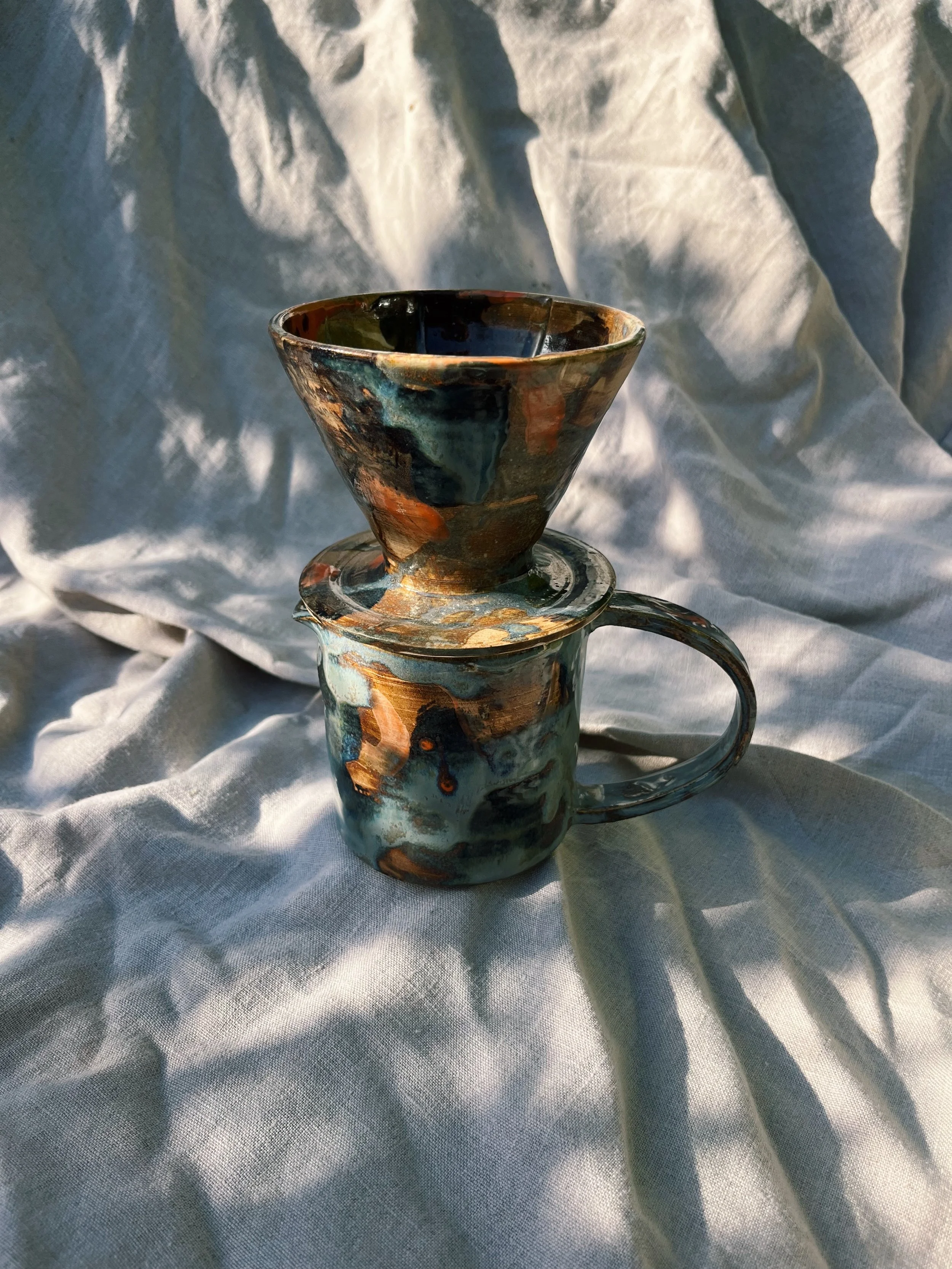 Coffee dripper and matching jug.