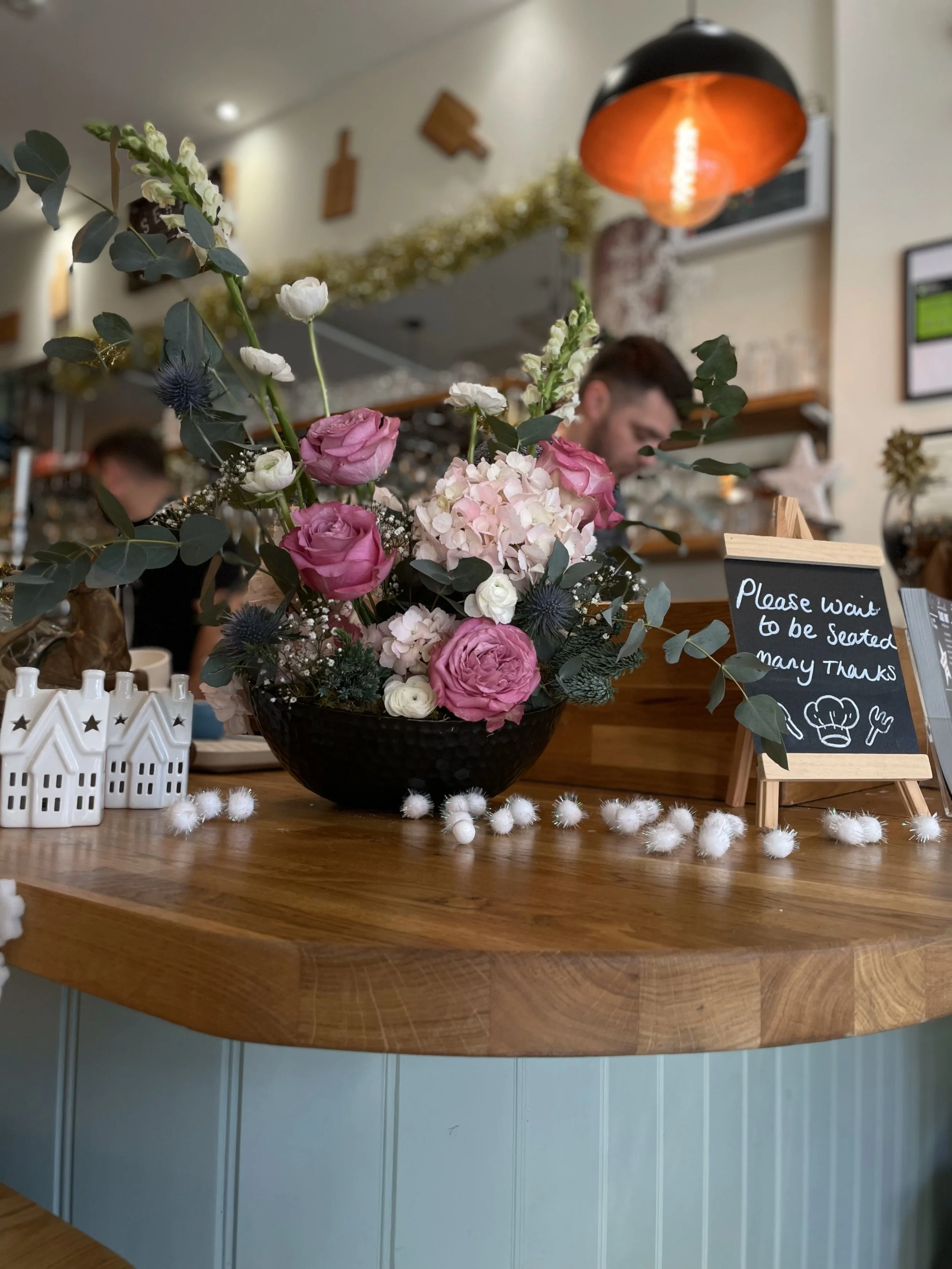 Flower arrangement in a coffee shop