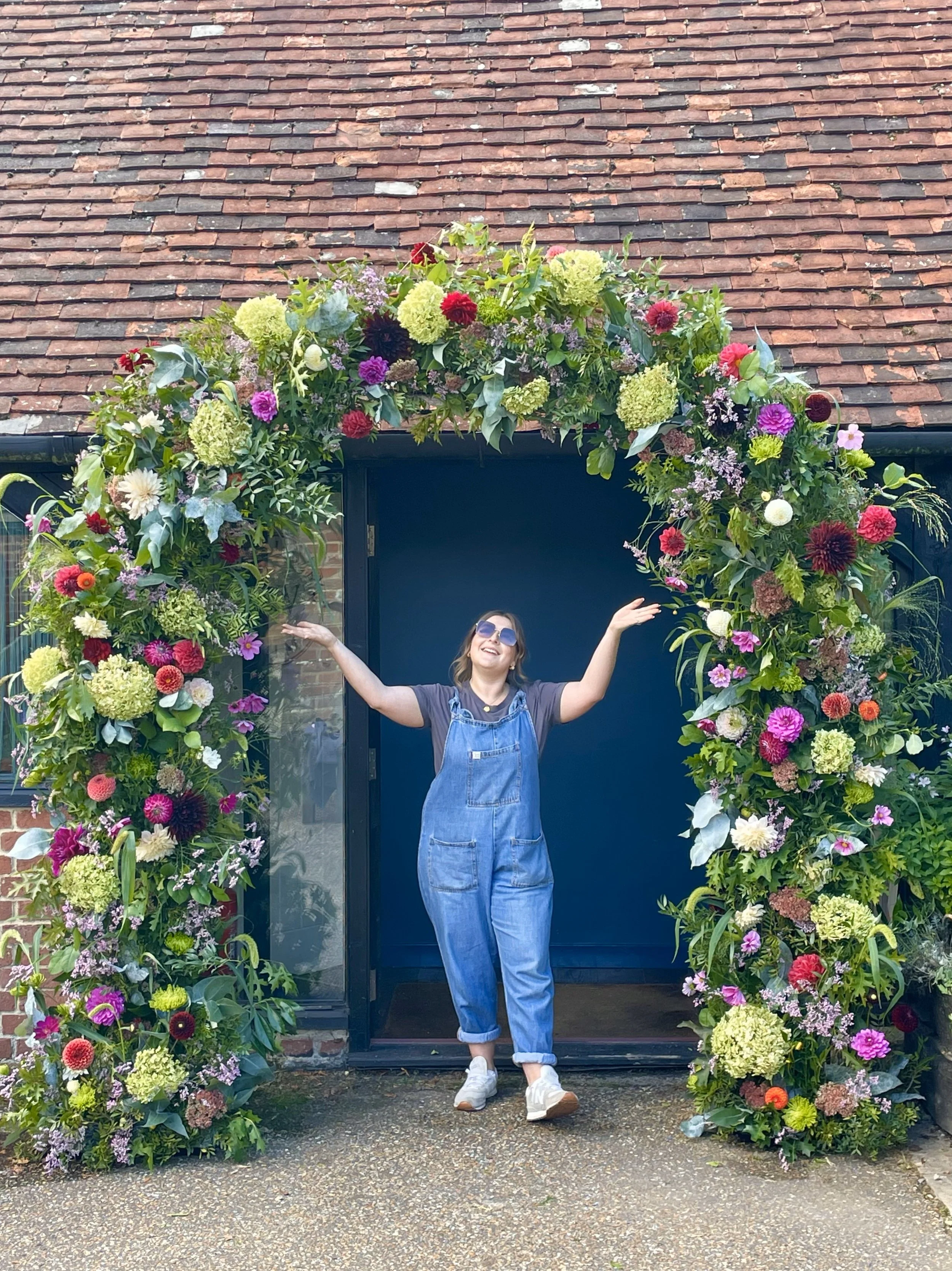 Large flower arche with seasonal Dahlias and Hydrangeas