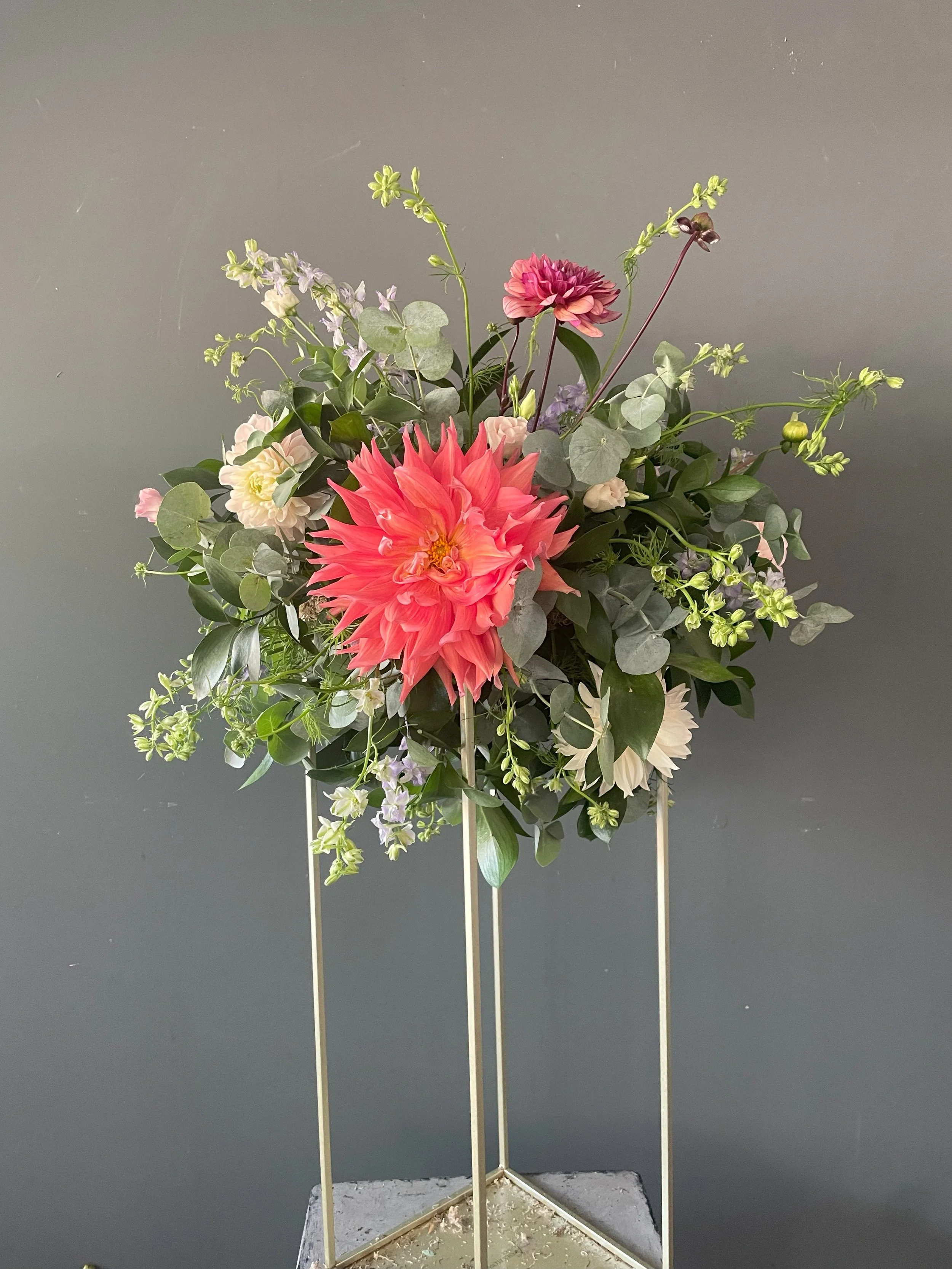 Table riser flower arrangement with Dahias