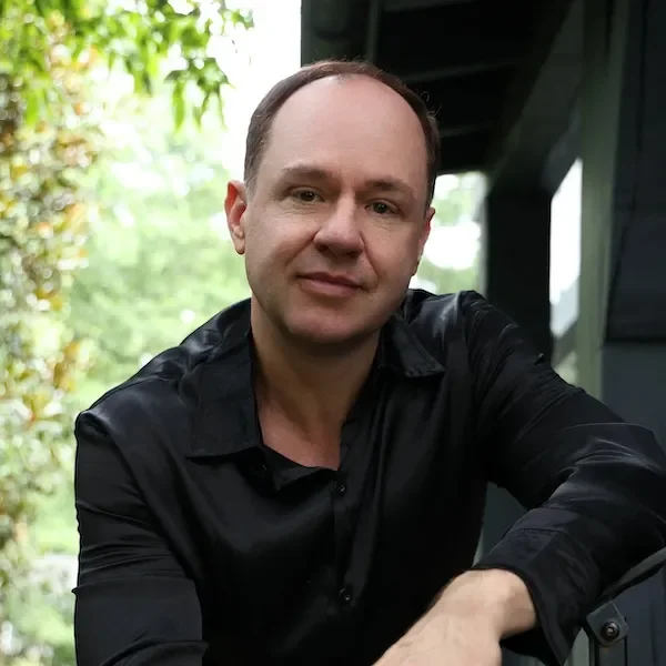 jonathon moon outdoors looking at the camera