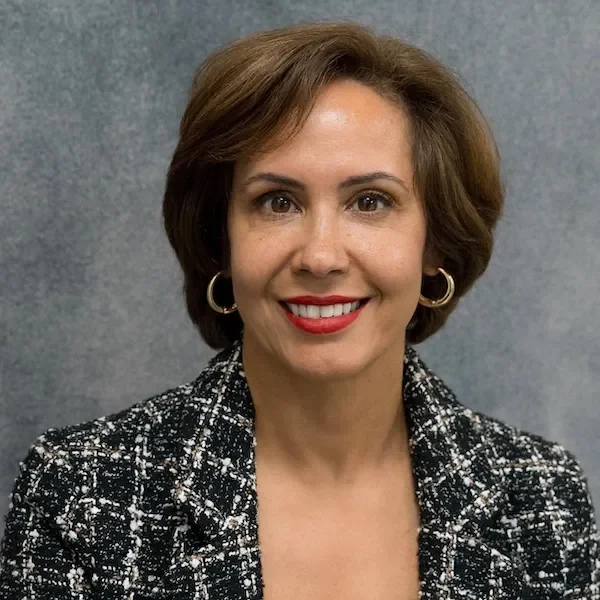 tania ramirez smiling at the camera