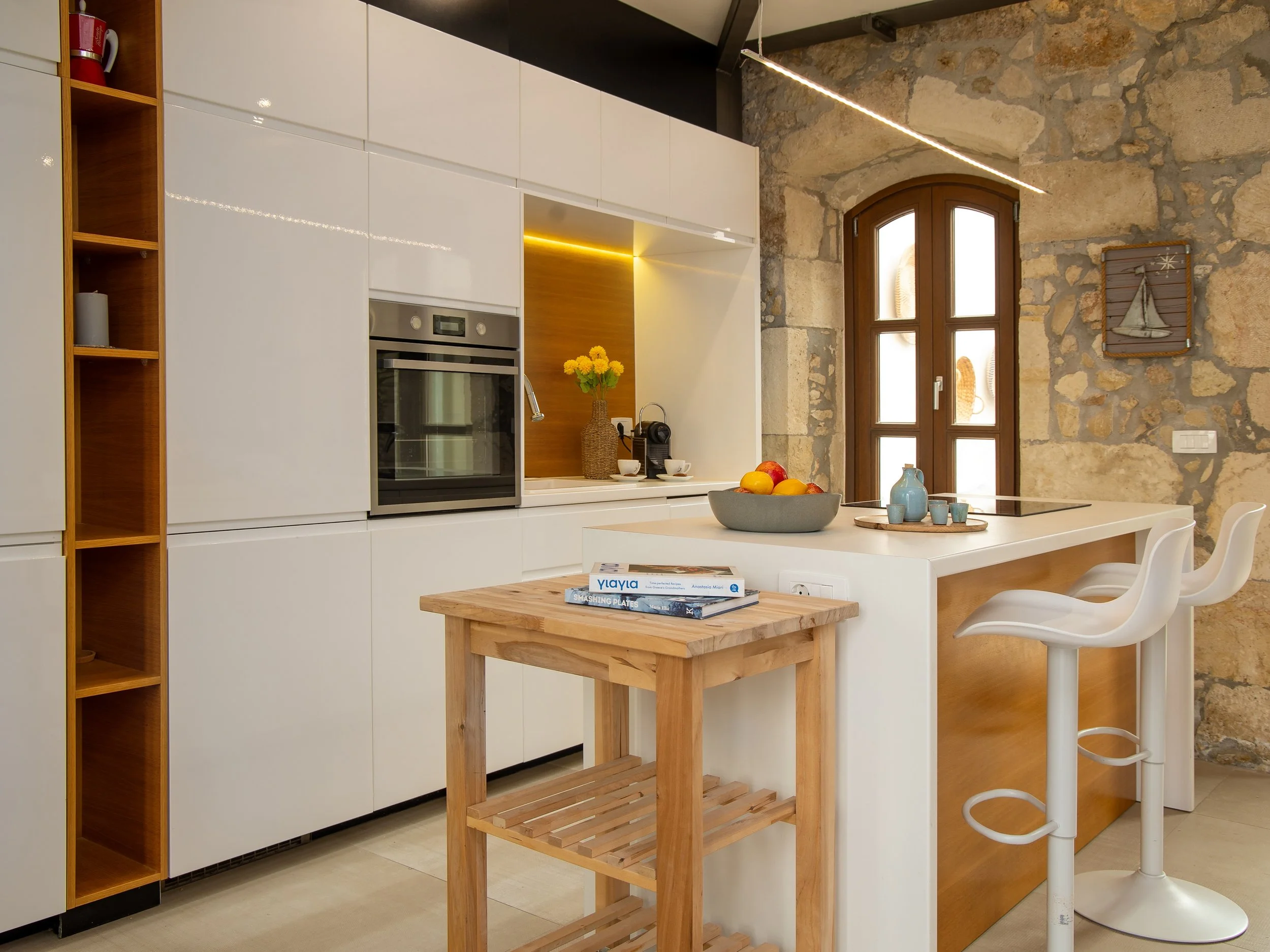 Fully equipped kitchen with a dining area.