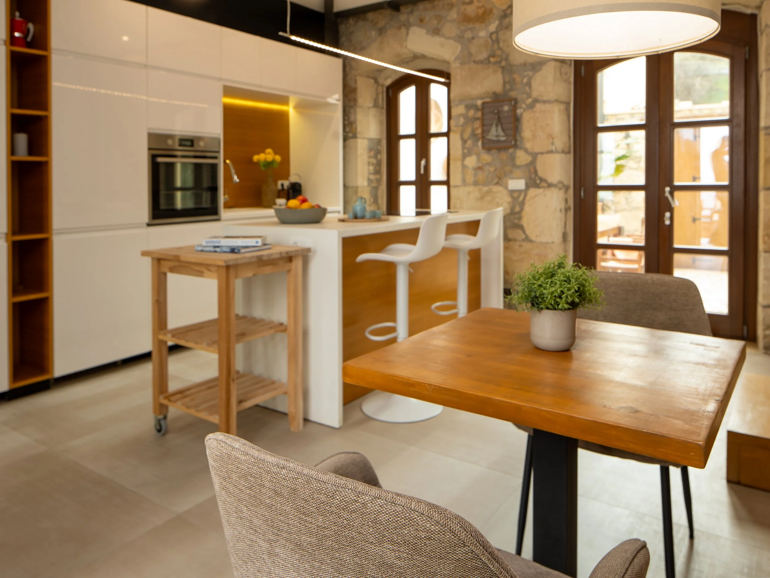 Fully equipped kitchen with a dining area.