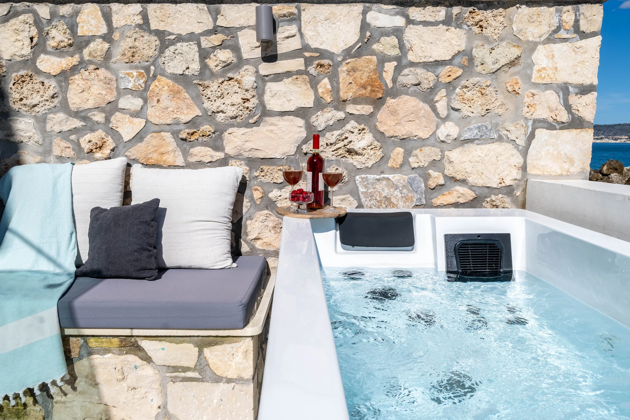 Enjoy your private jacuzzi on the front patio, the perfect place to relax and recharge after a day of exploring.