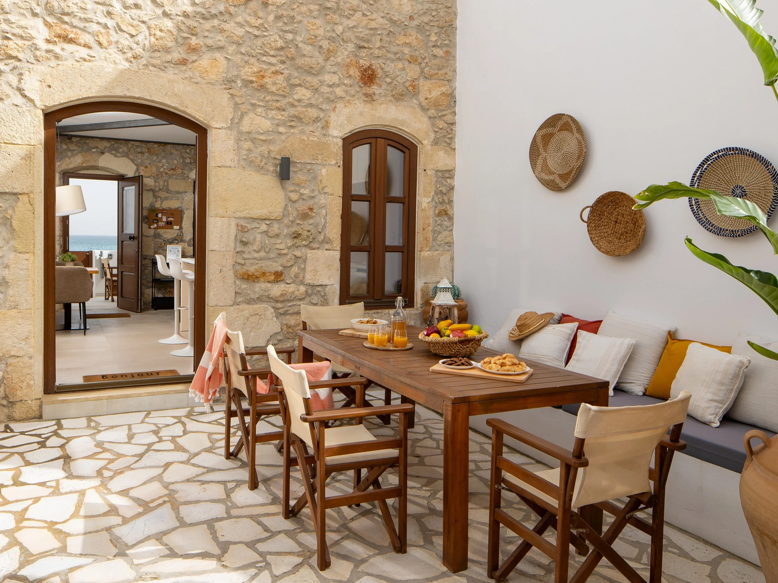 Spacious backyard patio with outdoor dining area and BBQ