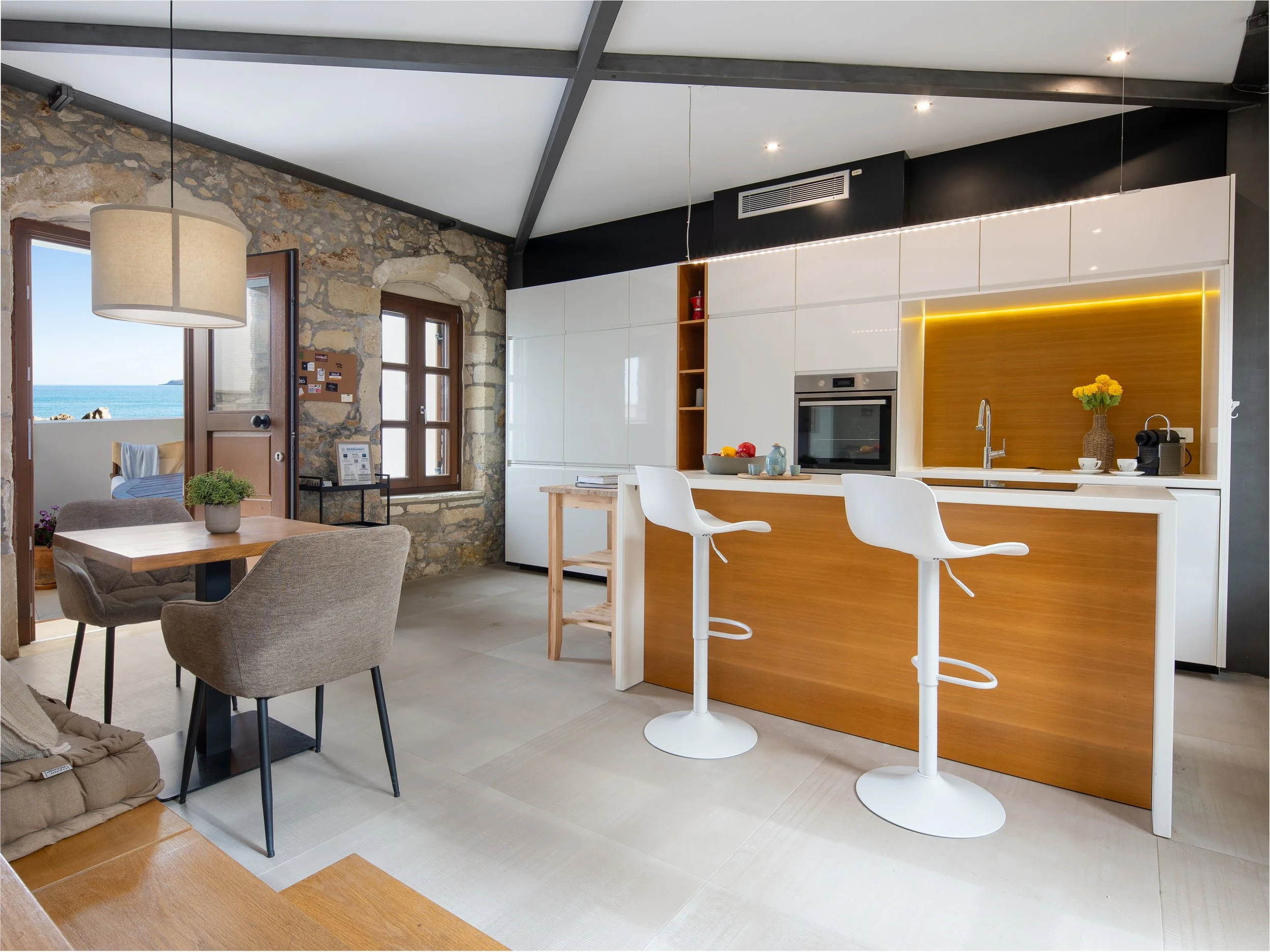 Fully equipped kitchen with a dining area.