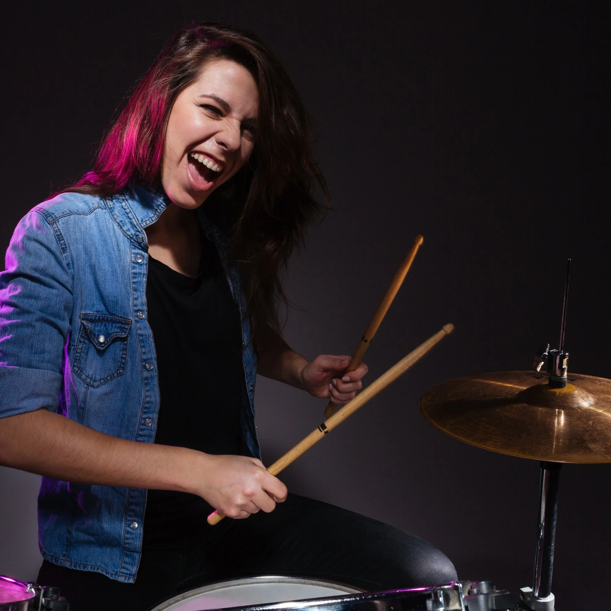 Student playing basic 4/4 rock drum beat during an in-home lesson in South Bay, CA
