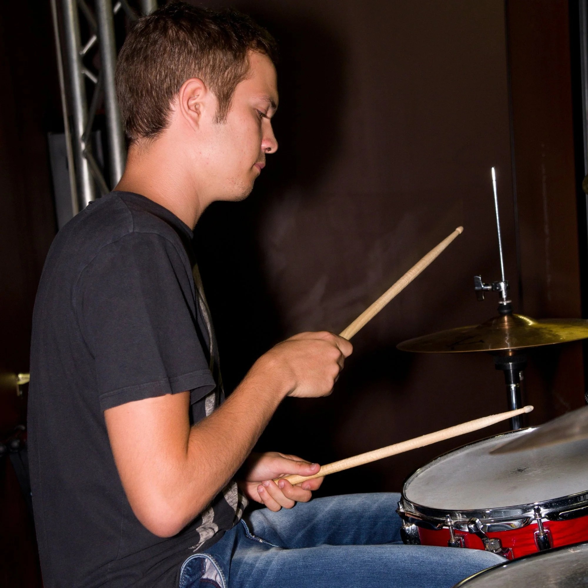 Drum student practicing dynamic control and volume balance during private in-home lesson in the South Bay area.