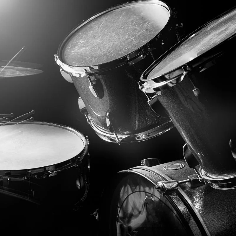 Drummer practicing hand and foot independence during in-home drum lesson in South Bay