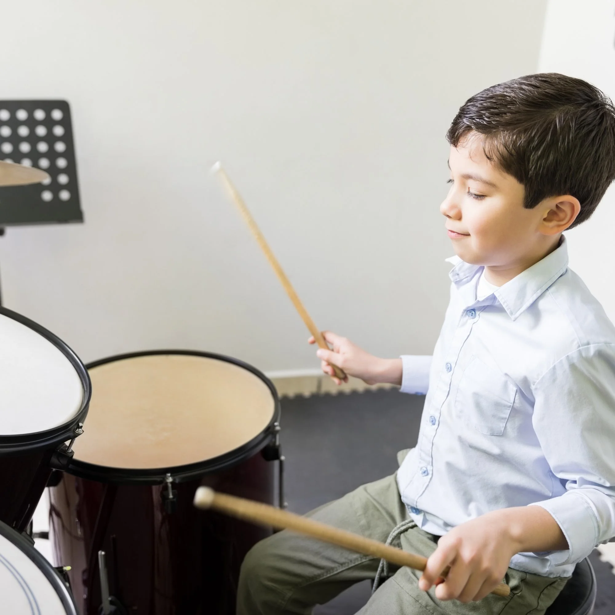 Student building hand speed and drumming endurance during in-home drum lesson in South Bay.