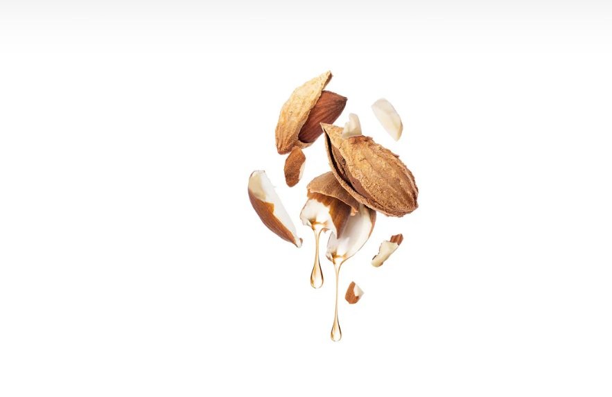 Cracked almond shells with dripping oil
