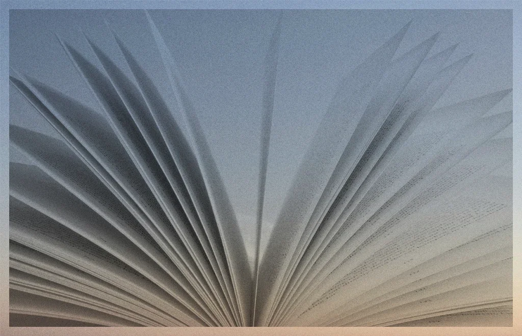 An open book representing the The Library at The Lantern in SE Portland Oregon